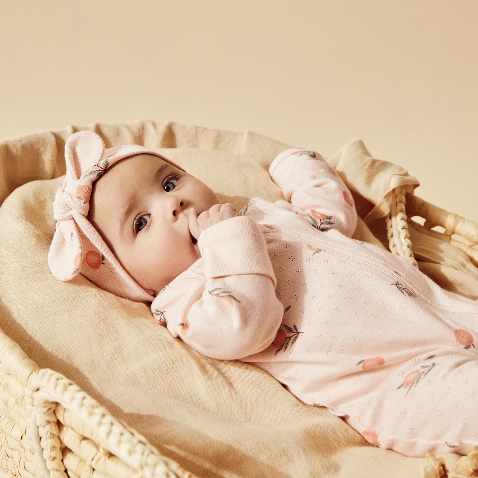 Organic Cotton Peaches Pointelle Zipsuit with Feet - Soft Baby Sleepwear for Newborns & Infants | Perfect for Nursery, Daycare & Snuggling