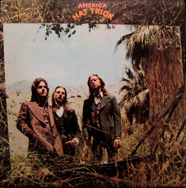 America Hat Trick LP Vinyl Album (VG+ Condition) - Rare Collectible Record for Music Enthusiasts & Vintage Vinyl Lovers - Perfect for Home Listening, Gifts, and Record Collections
