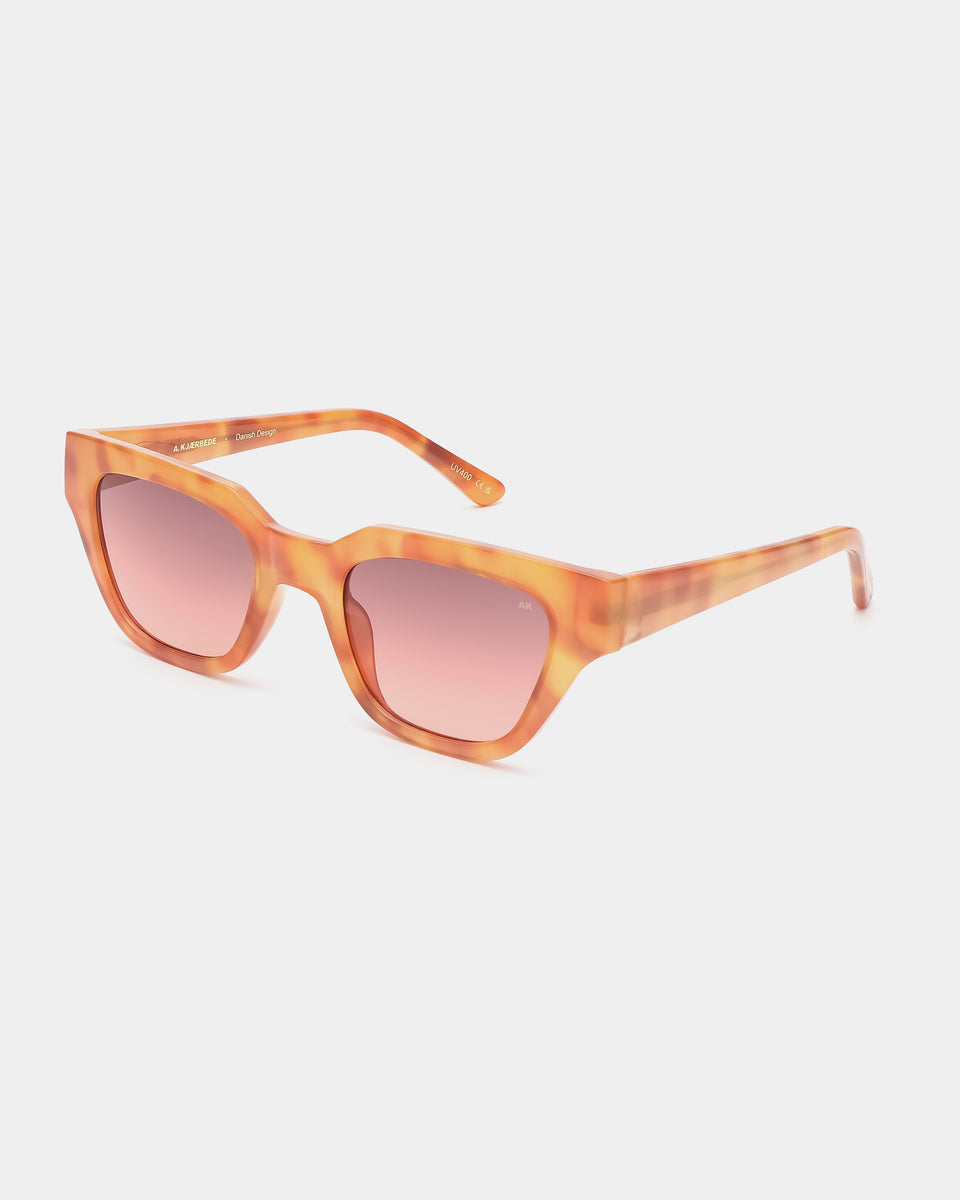 Kaws Burnt Amber Sunglasses - Stylish UV Protection Shades for Men & Women - Perfect for Outdoor Activities, Beach, and Fashion Statements