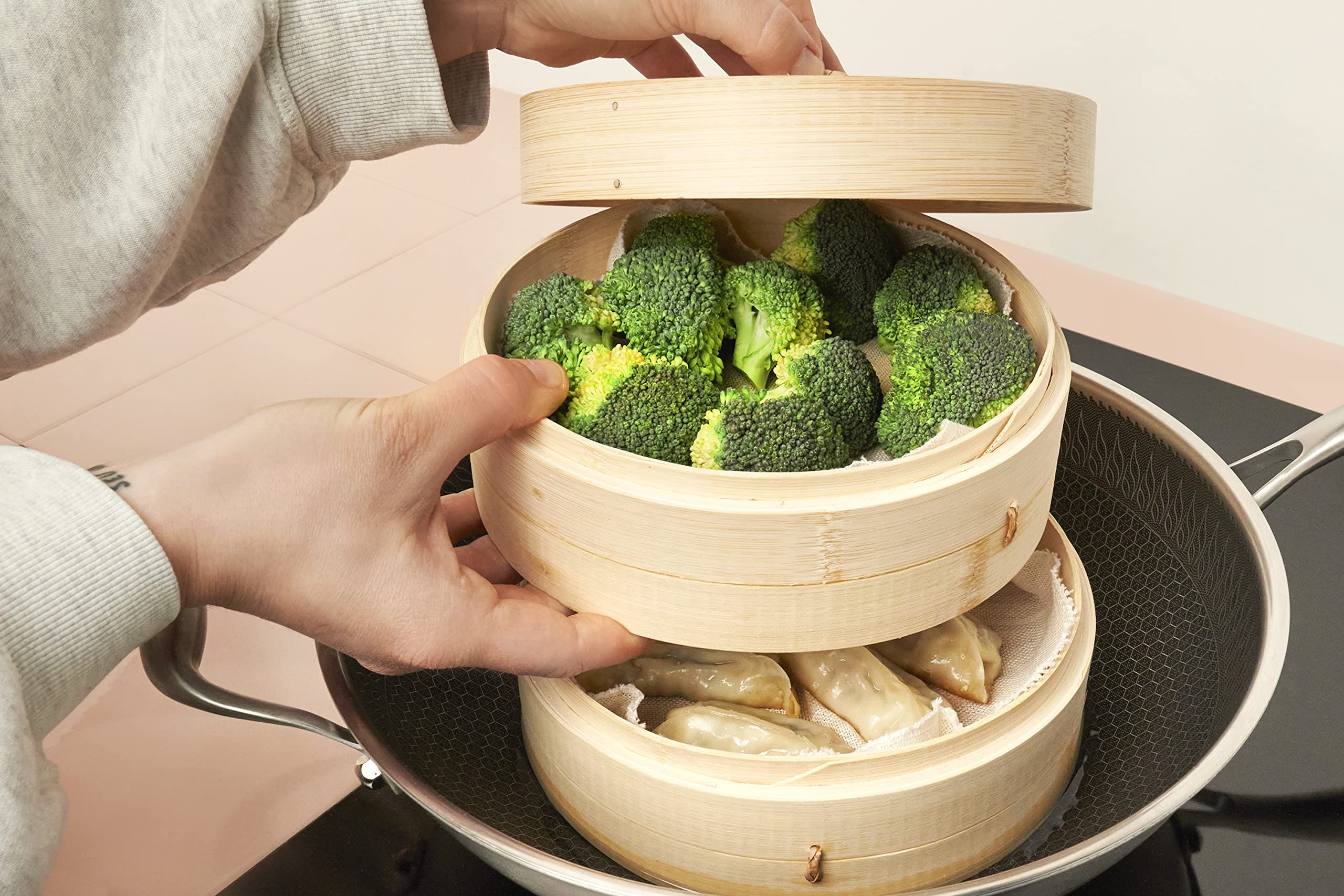 Reishunger 10 Inch Bamboo Steamer Basket - Handmade 2-Tier Traditional Design for Dumplings, Dim Sum, Vegetables, Fish & Meat - Includes 2 Cotton Liners - Perfect for Asian Cooking, Meal Prep & Healthy Steam Cooking at Home
