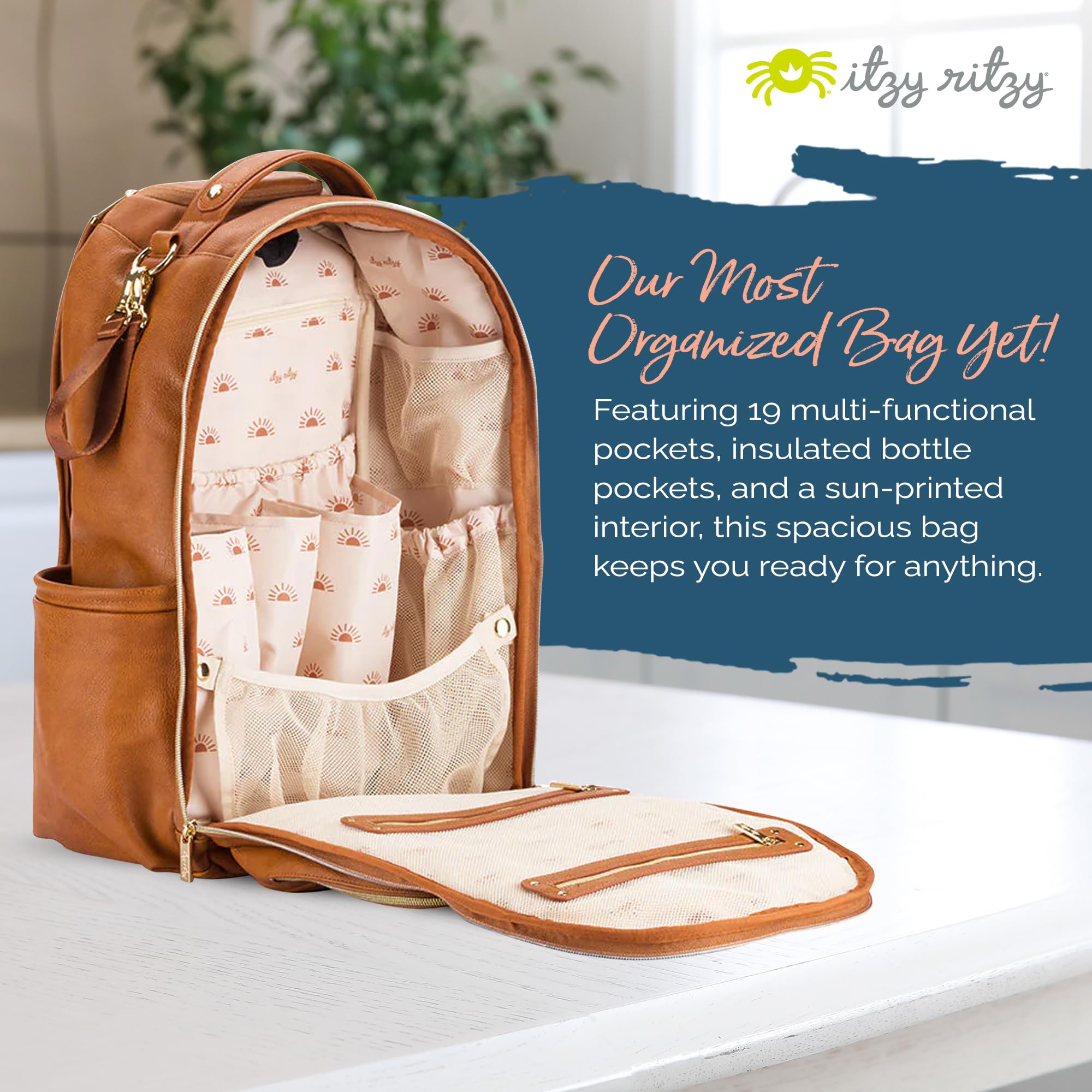 Itzy Ritzy Boss Plus Baby Diaper Backpack – Large Capacity with 19 Pockets, Changing Pad & Stroller Clips | Comfortable Shoulder Straps in Cognac | Perfect for Moms, Dads & Caregivers on the Go