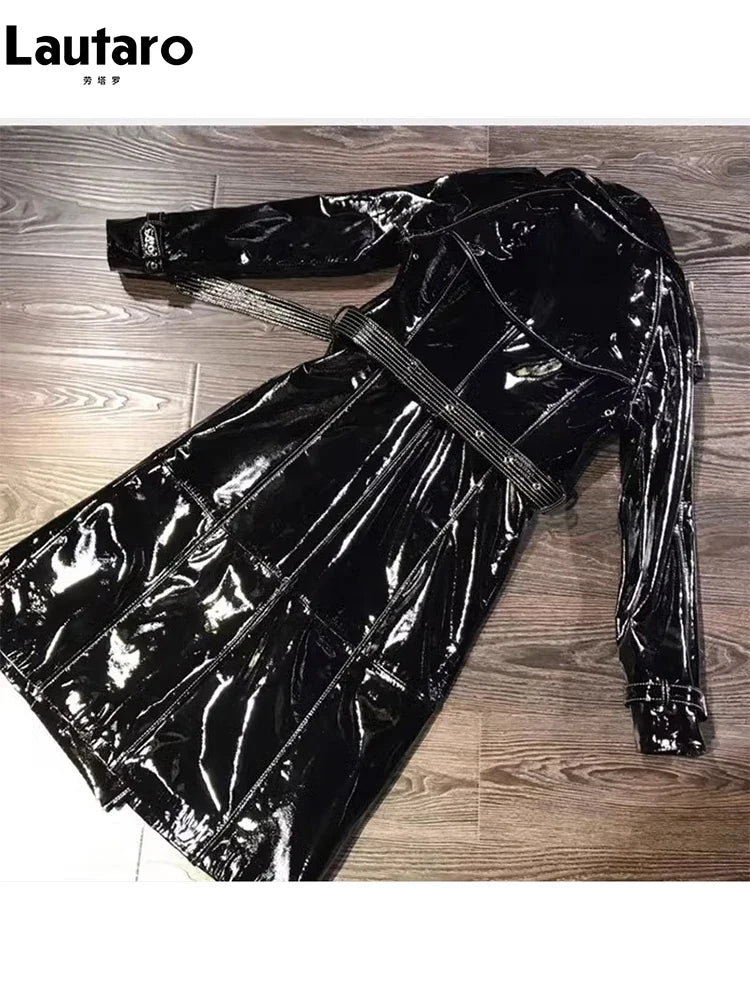 Women's Autumn Long Shiny Reflective Patent Faux Leather Trench Coat - Double Breasted Runway Style with Sashes | European Fashion Outerwear for Fall Season | Perfect for Evening Events, Parties and Fashion Shows