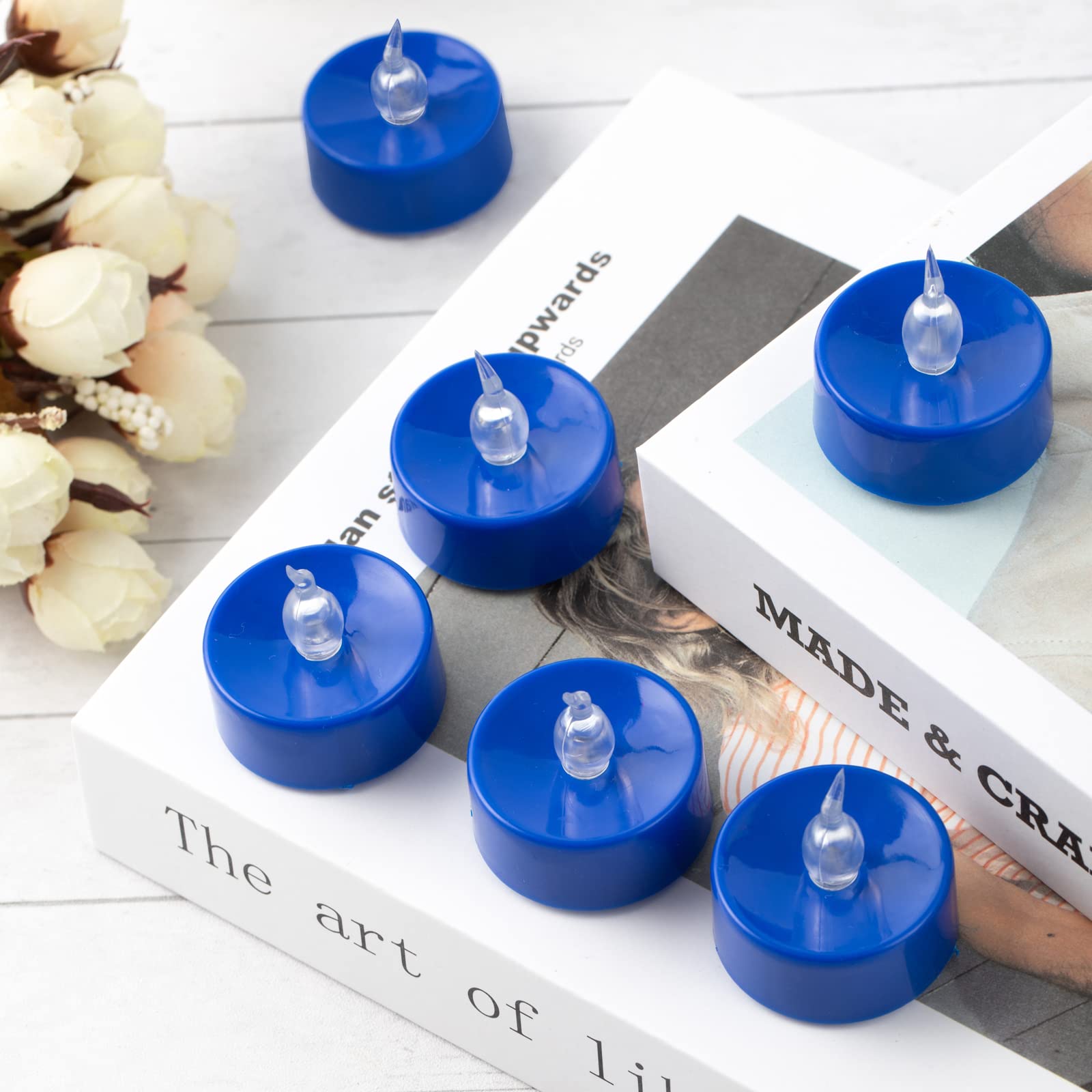 24-Pack Blue Flickering LED Flameless Tea Light Candles - Battery Operated Fake Candles with Realistic Flame Effect - Perfect for Halloween Decor, Wedding Centerpieces, and Romantic Dinner Ambiance