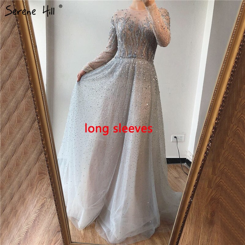 Elegant Silver Arabic Luxury Beaded Cape Sleeve A-Line Evening Dress 2025 - V-Neck Sexy Formal Gown for Women | Perfect for Prom, Wedding, and Red Carpet Events