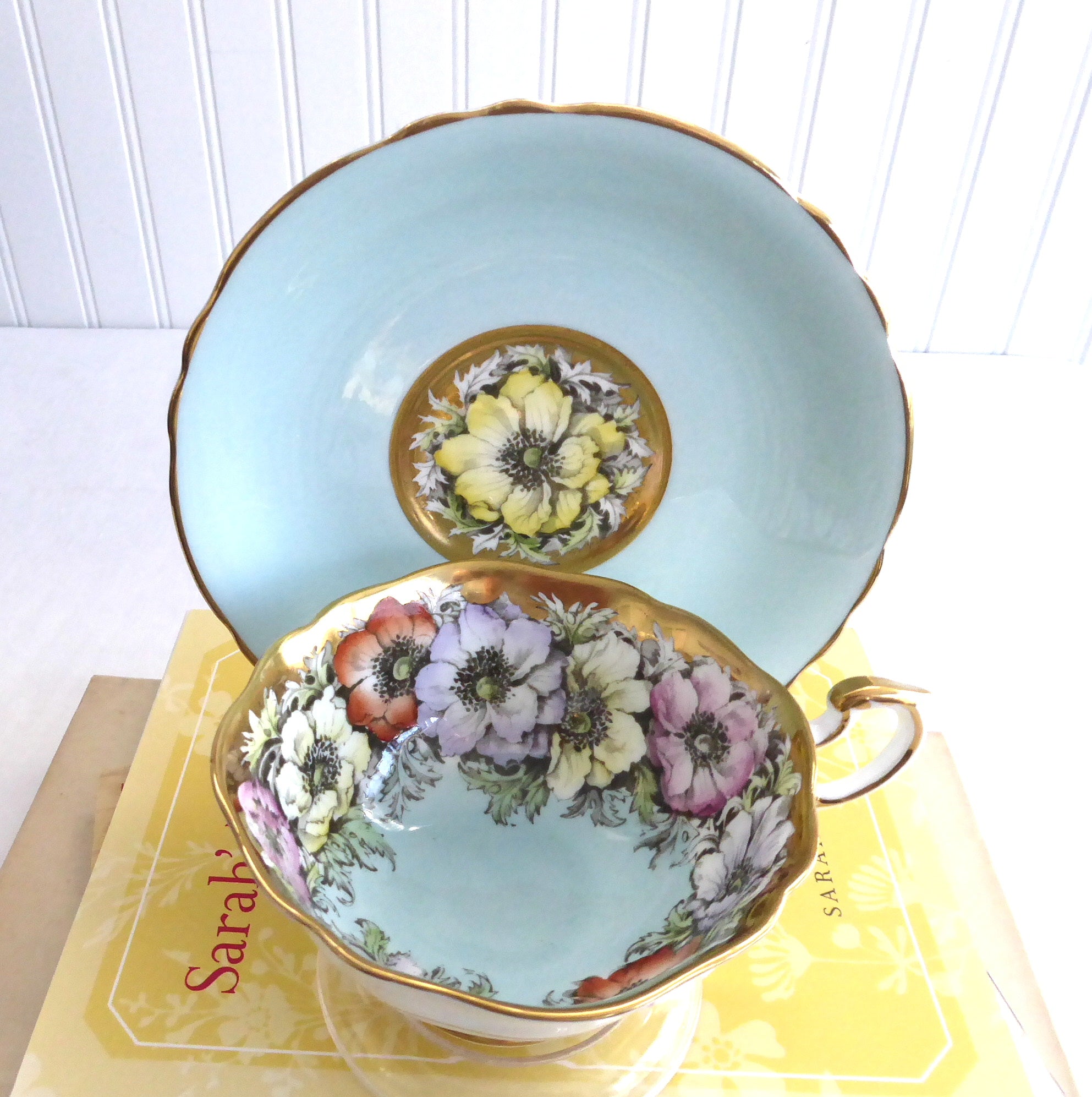 Vintage Paragon Cup and Saucer Set - Luxe Gold Trim with Aqua Poppies Design, Queen Elizabeth Warrant 1950s - Perfect for Afternoon Tea, Collectible China Display, and British Royalty Memorabilia