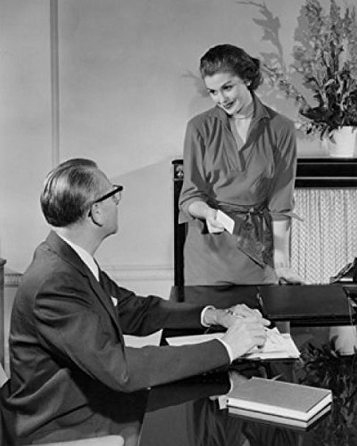 Businessman and Businesswoman Discussing in Office - Premium 18x24 Poster Print for Office Decor, Motivational Wall Art, Corporate Gifts & Home Office Inspiration