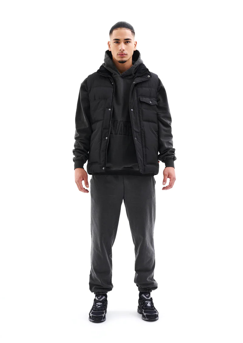 Black Cutback Vest for Men & Women - Stylish Layering Piece for Outdoor Adventures & Casual Wear