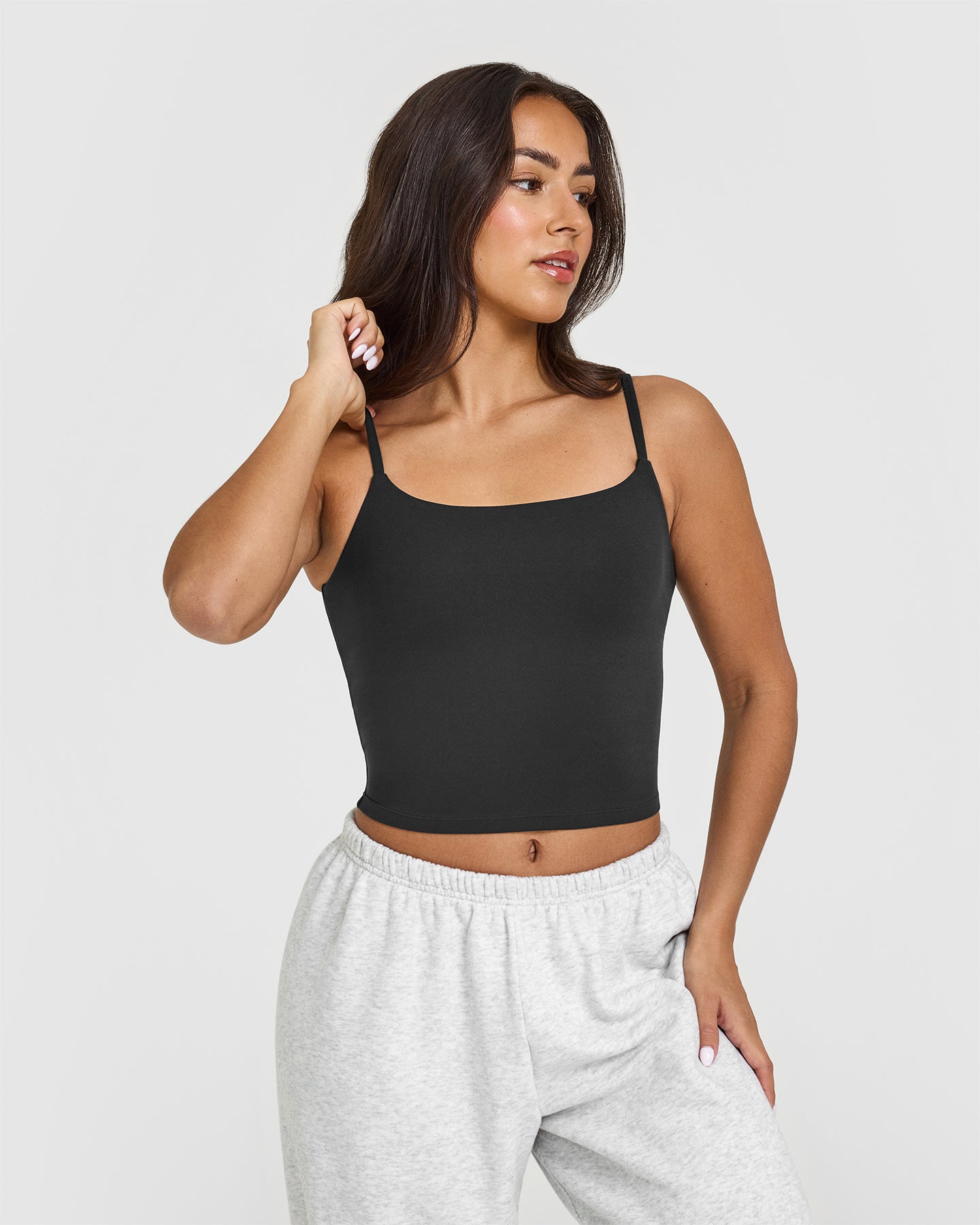 SoftMotion™ Strappy Mid Vest with Built-in Bra Shelf - Soft Black | Seamless Comfort for Yoga, Workouts & Lounge Wear