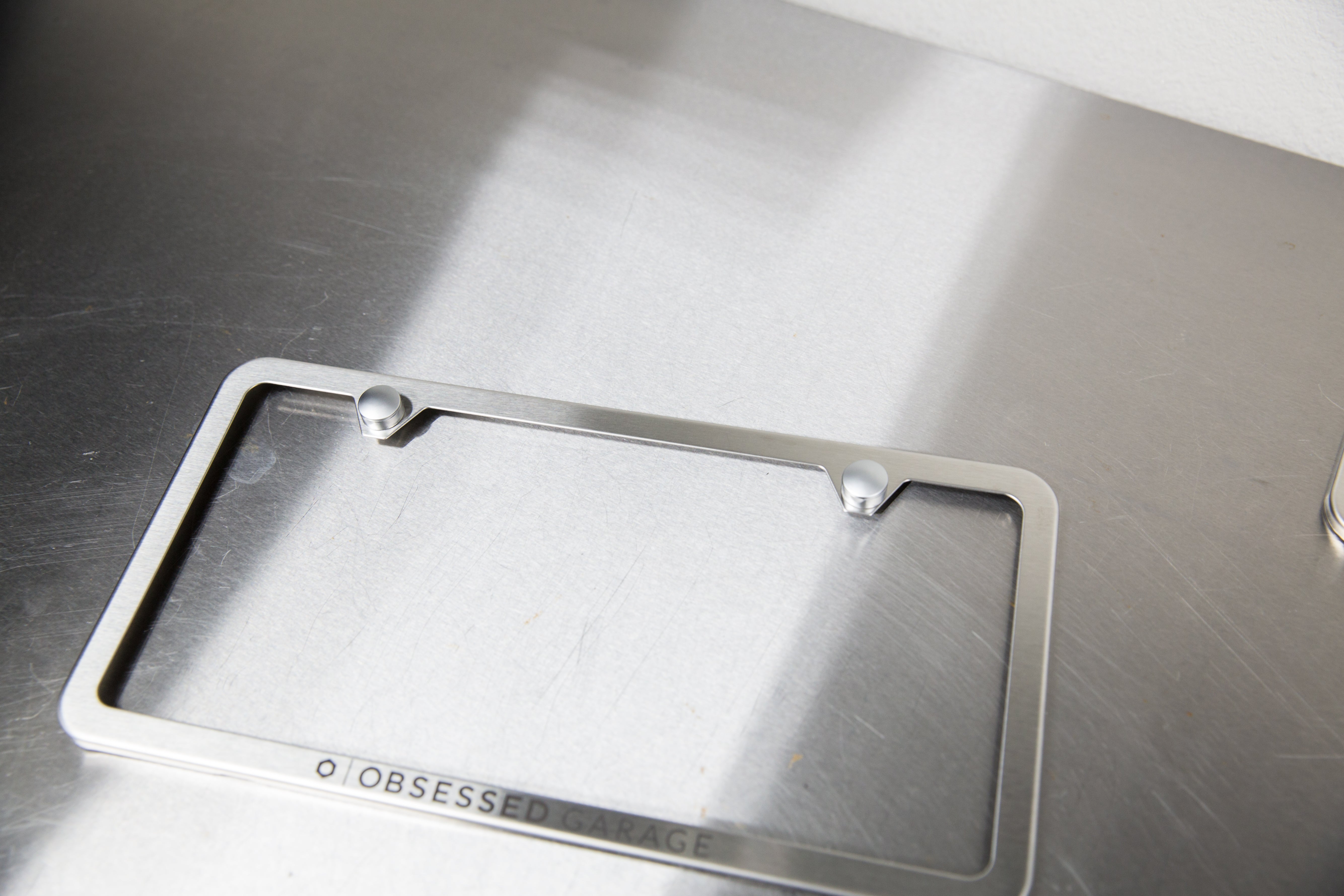 Premium Stainless Steel License Plate Frame - Rustproof & Durable Car Accessory for US Vehicles - Perfect for Cars, Trucks & SUVs - Enhances Vehicle Appearance & Protection