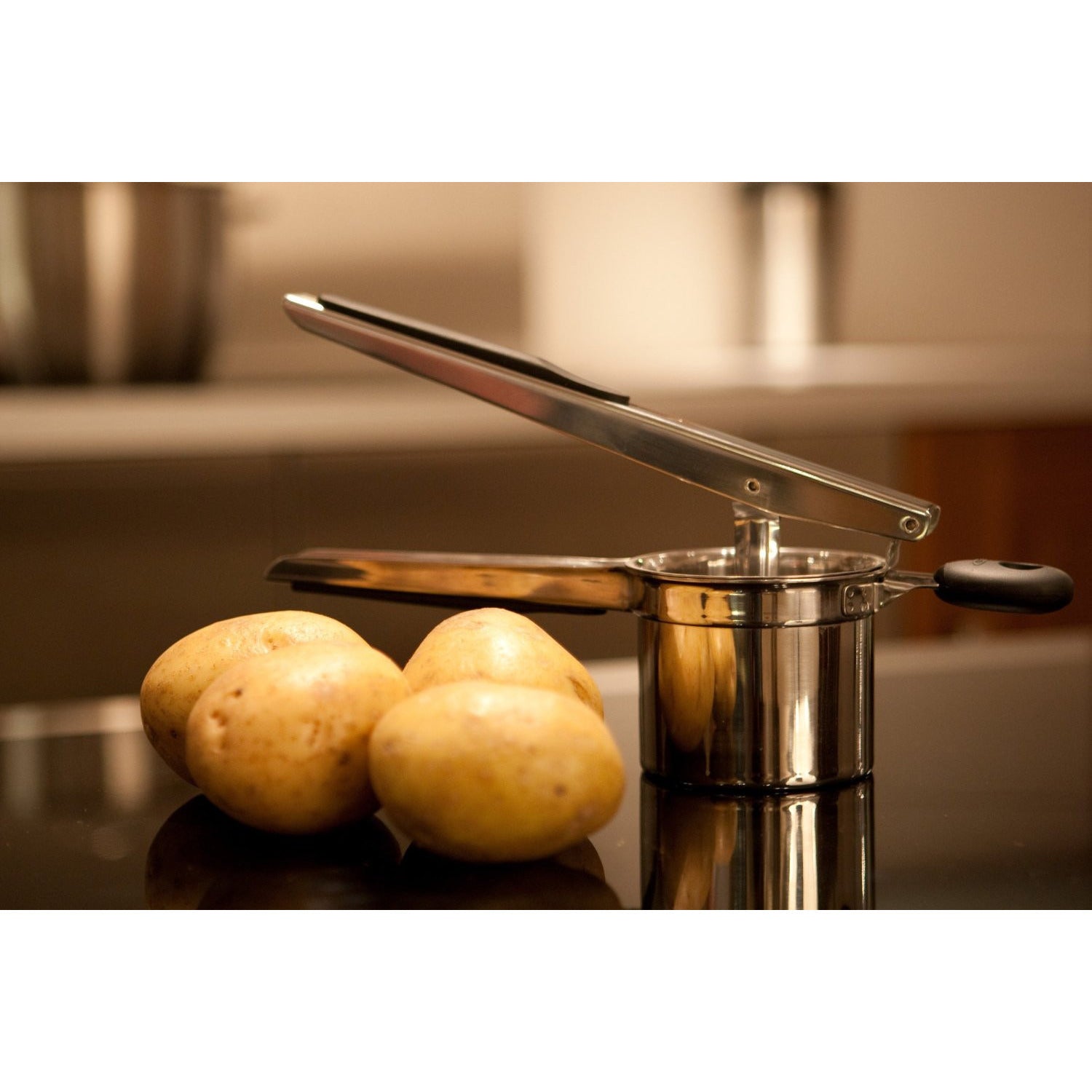 OXO Stainless Steel Potato Ricer - Heavy Duty Kitchen Tool for Mashed Potatoes, Baby Food & Purees - Perfect for Home Cooking & Meal Prep