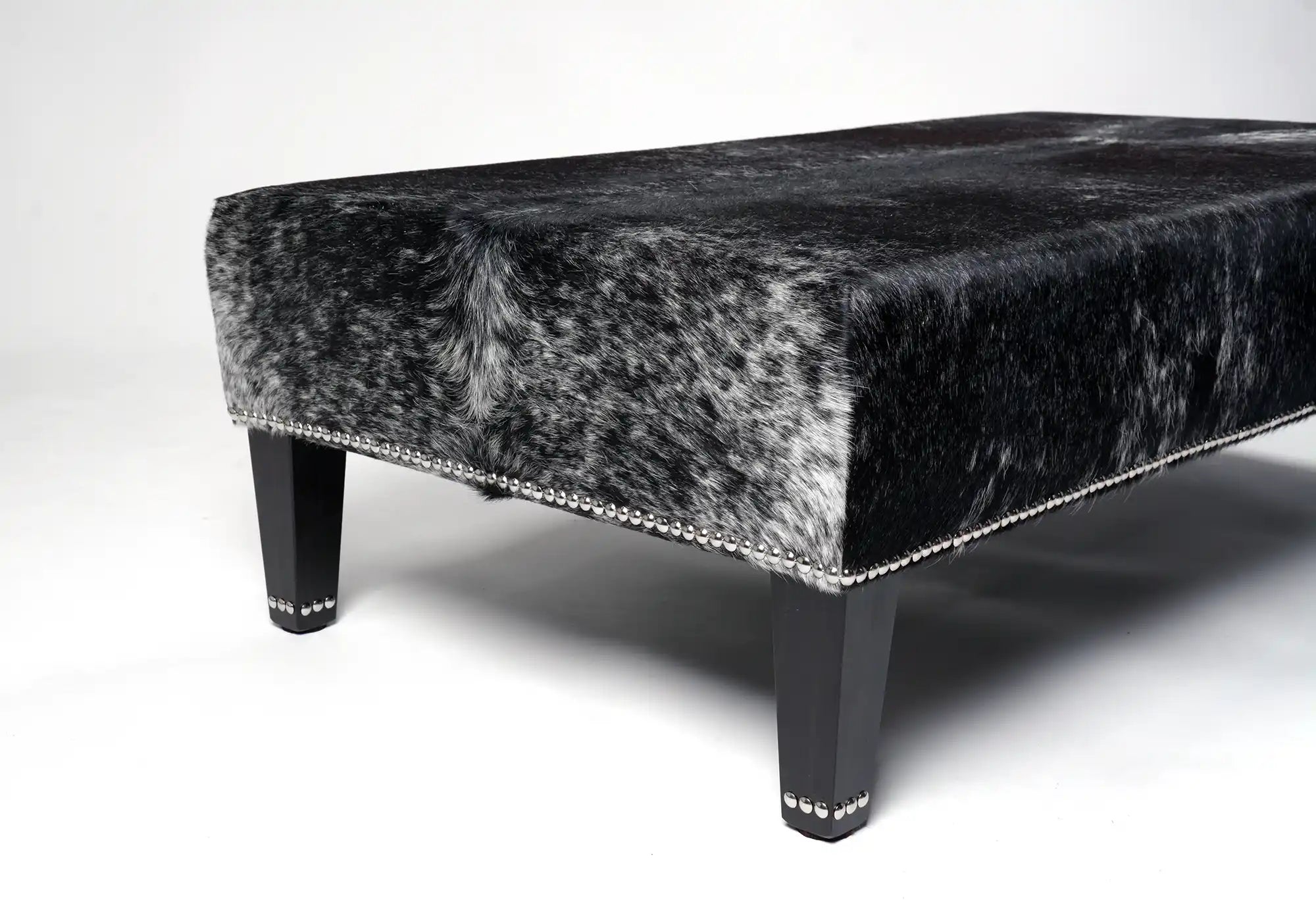 Premium Cowhide Ottoman with Sturdy Wood Stud Legs - 51