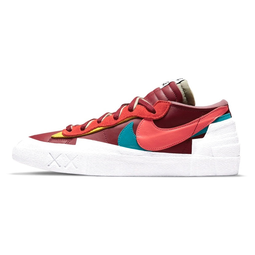 KAWS x Nike x Sacai Blazer Low Sneakers - Team Red/Hot Lava/White Colorway - Limited Edition Collaboration Shoes for Streetwear & Sneaker Collectors | Perfect for Casual Wear, Sneaker Events & Fashion Outfits
