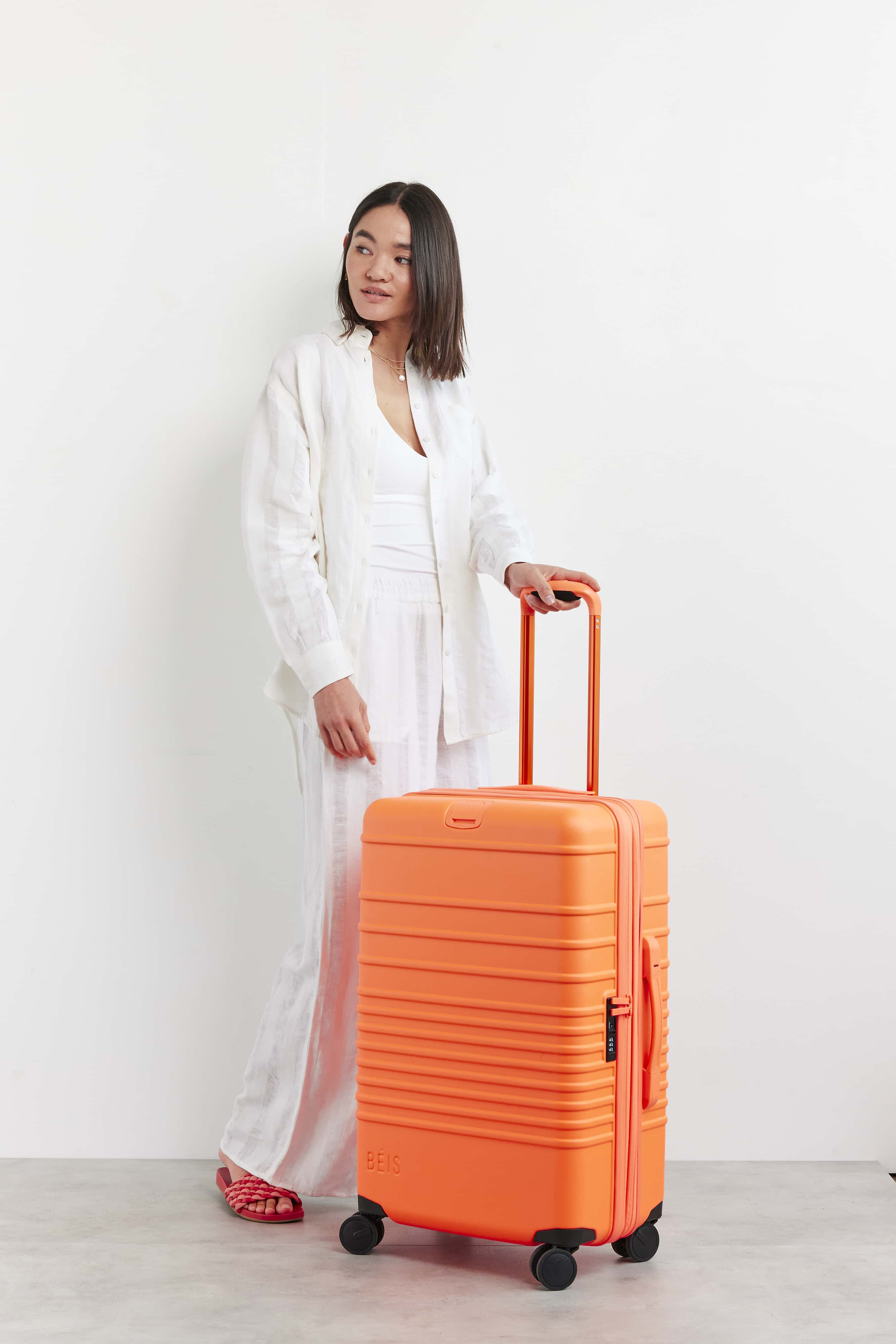 Creamsicle Medium Check-In Roller Luggage - Lightweight Spinner Suitcase for Travel, Business Trips & Weekend Getaways