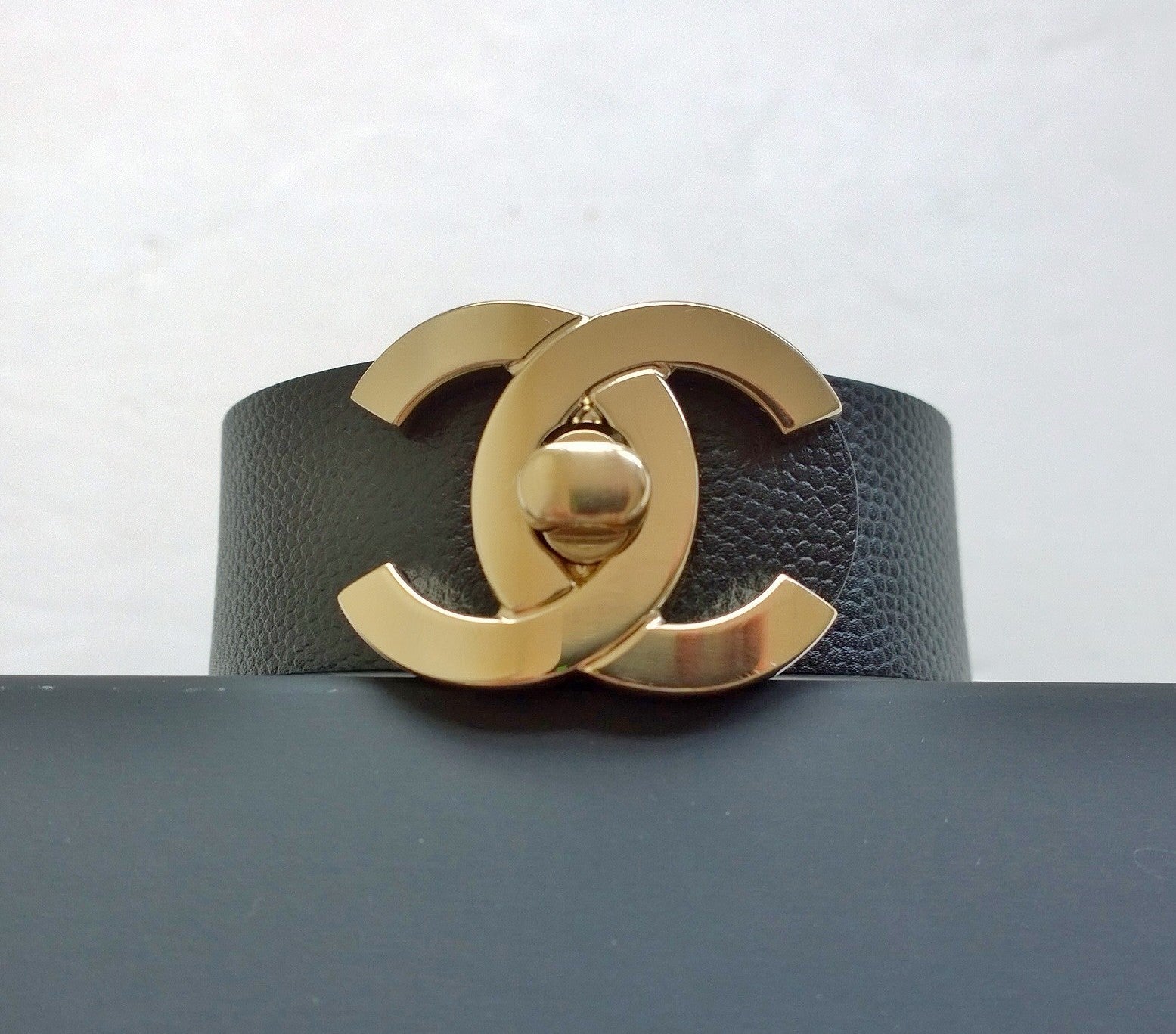 Chanel CC Cuff Bracelet in Black Leather with Gold Logo - Luxury Fashion Jewelry for Women - Perfect for Parties, Weddings & Special Occasions