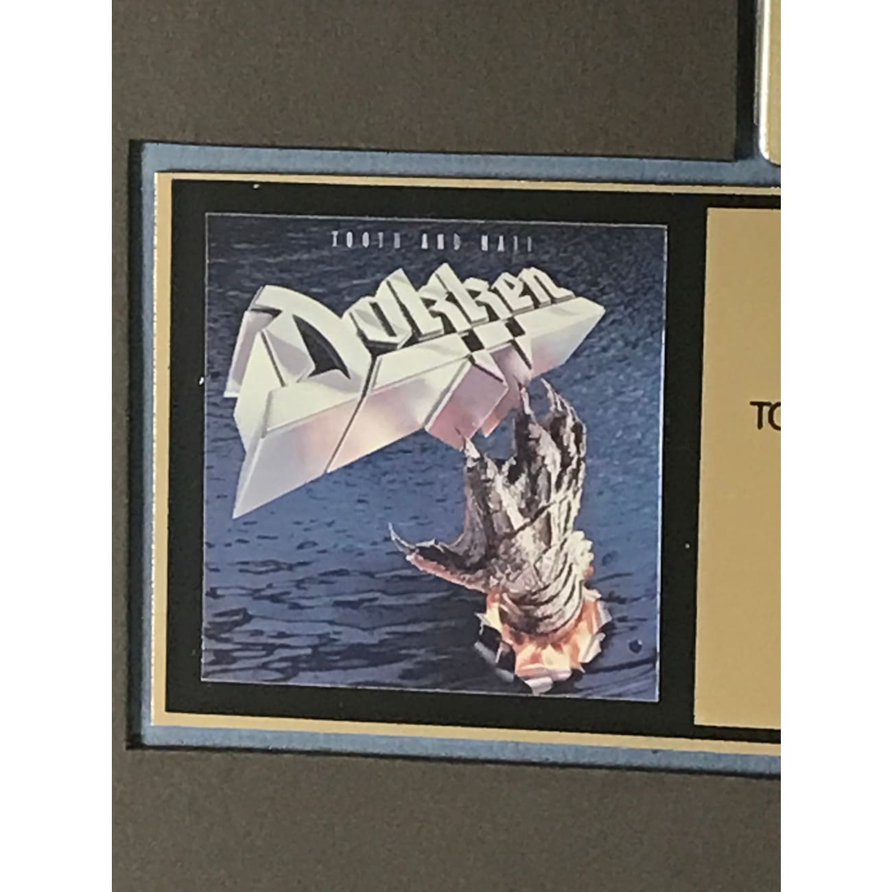 Dokken Tooth And Nail RIAA Gold Album Award - Vintage Heavy Metal Music Collectible for Fans & Display