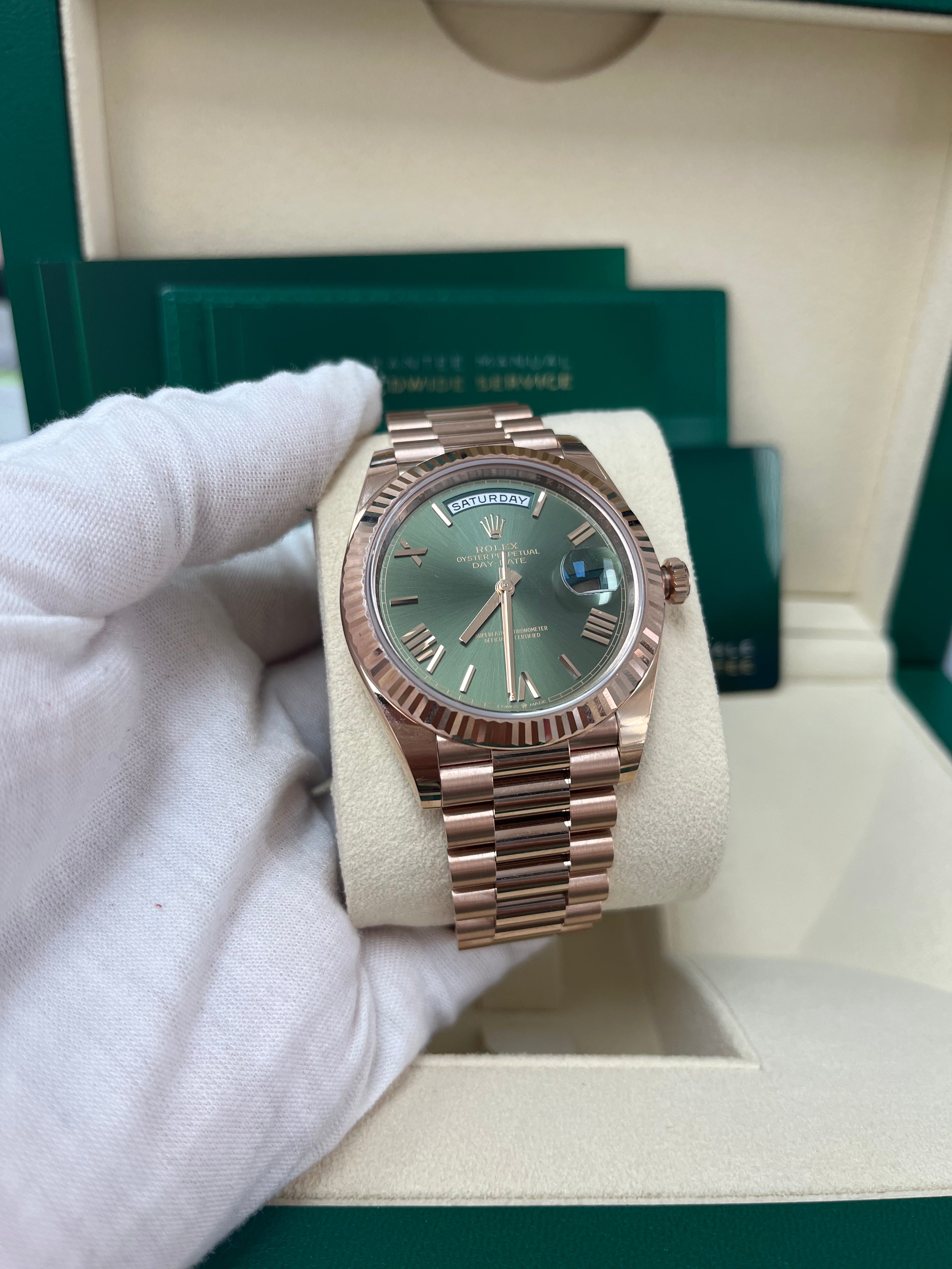 Rolex Day Date 40 Rose Gold Watch with Green Roman Dial & Fluted Bezel (Ref#228235) - Luxury Dress Watch for Business & Formal Occasions