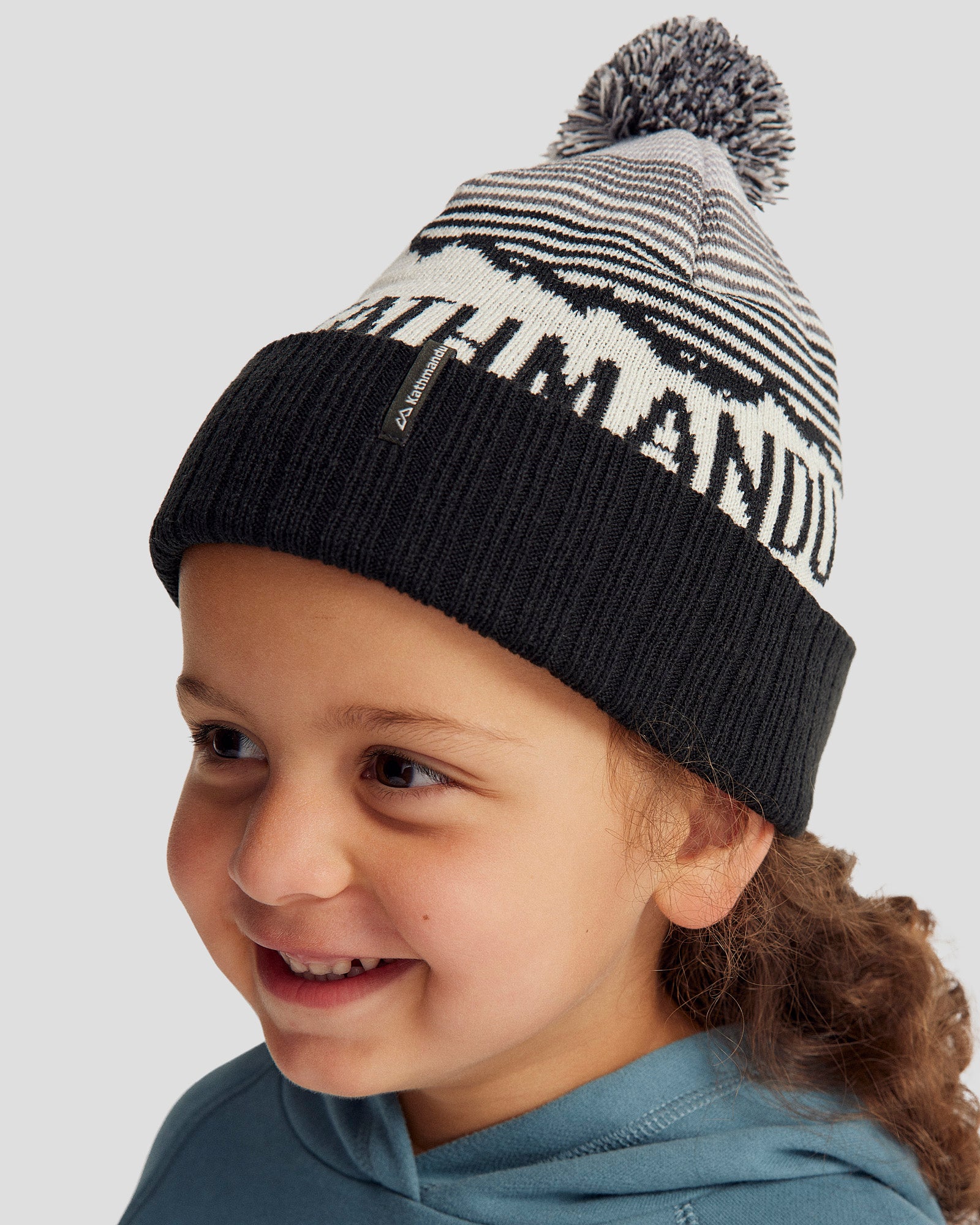 Kids' Mountain Skies Pompom Beanie - Soft Winter Hat for Boys & Girls - Black/White/Grey - Perfect for Snow Play, Skiing & Outdoor Adventures
