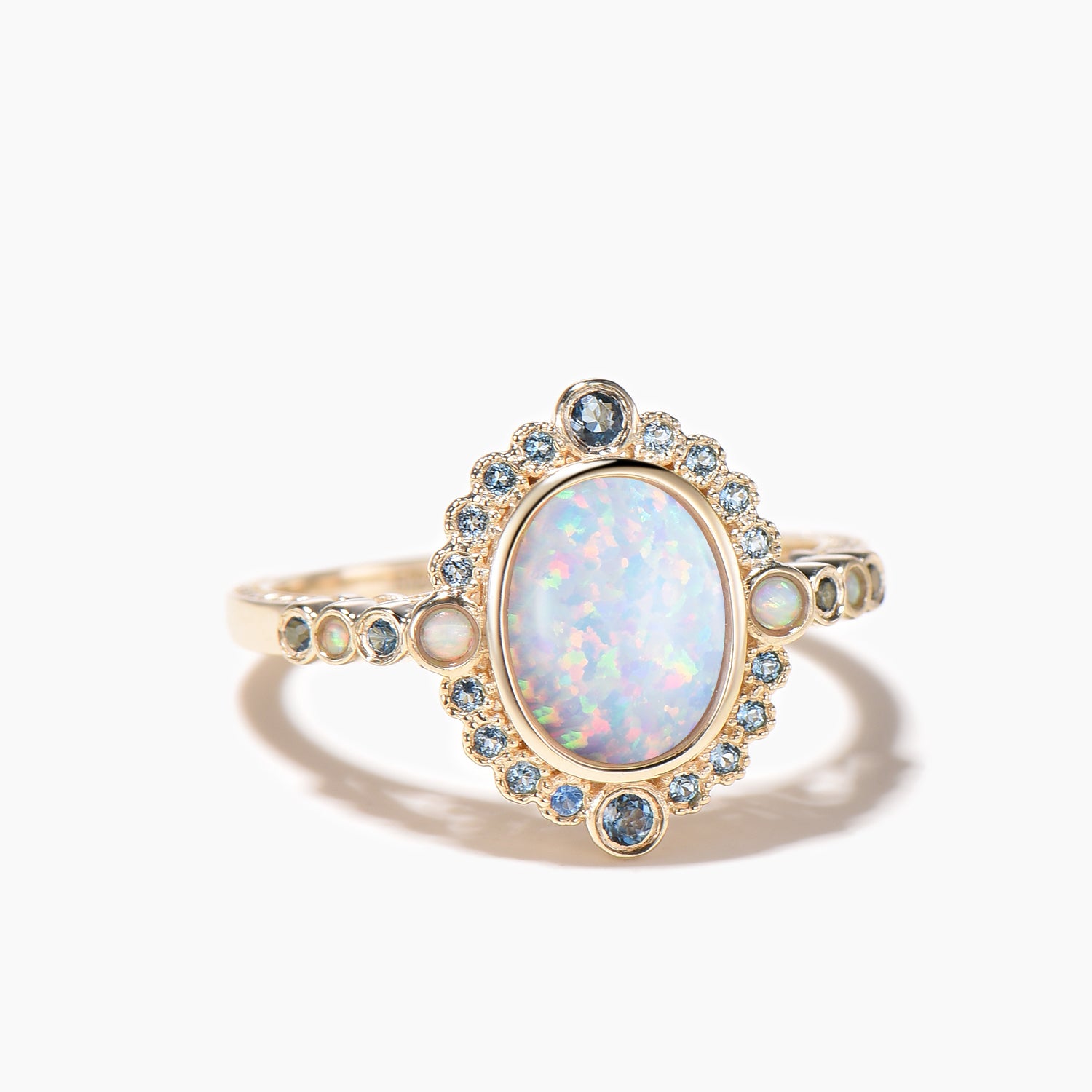 Oval Cut White Opal Engagement Ring with Blue Topaz Halo in 14K Yellow Gold - Perfect for Wedding, Proposal & Anniversary Gifts