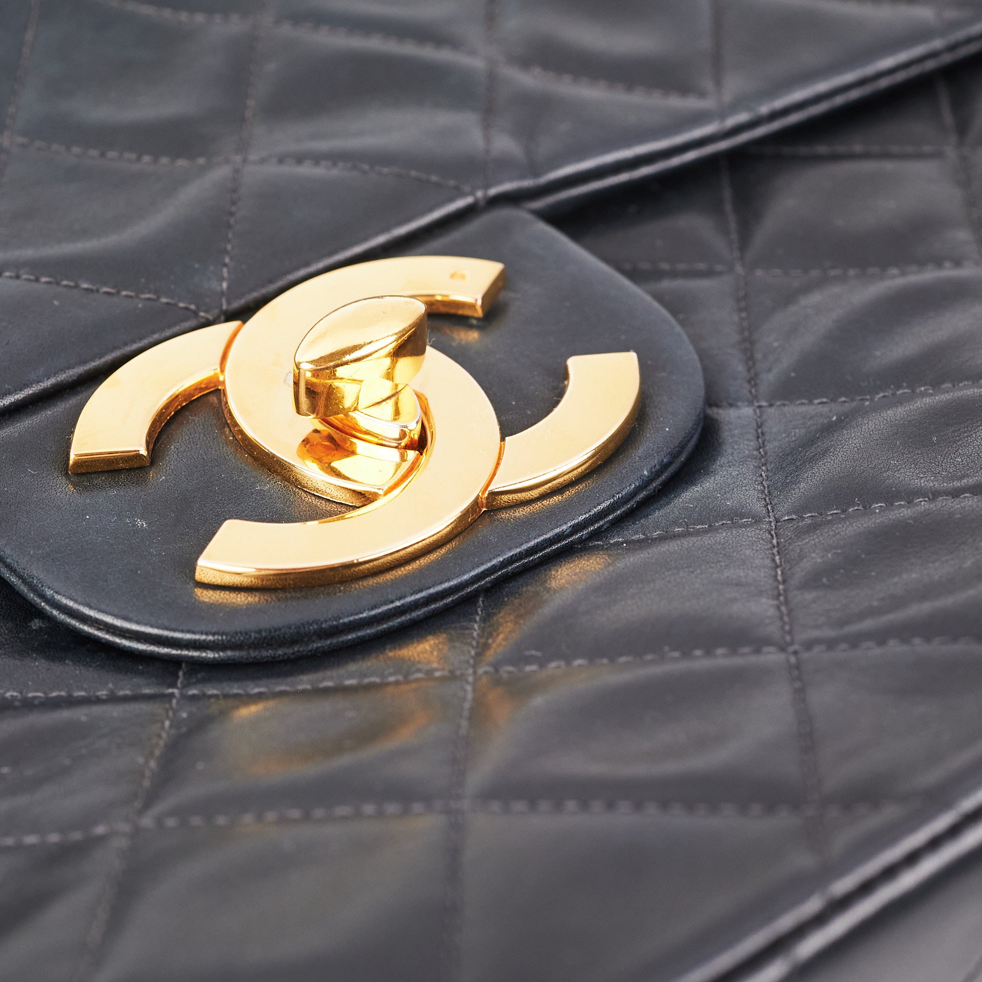 Vintage Chanel Maxi Flap Bag in Black with 24K Gold Hardware - Perfect for Luxury Fashion & Special Occasions