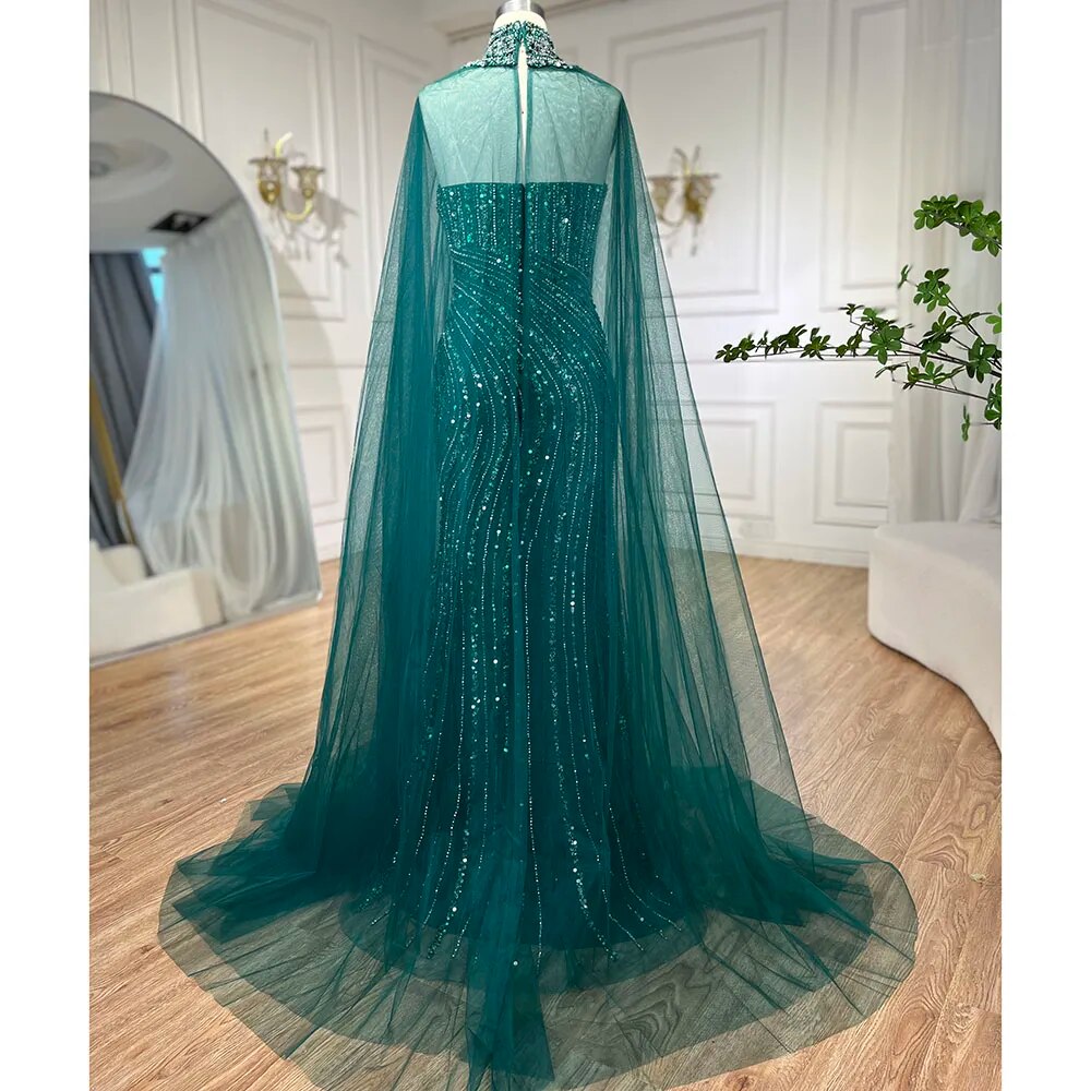 Elegant Green Mermaid Evening Gown with Cape Sleeves & Beaded Details - Arabic Style Wedding Dress for Women - Perfect for Bridal Parties, Prom Nights & Formal Events LA72073A