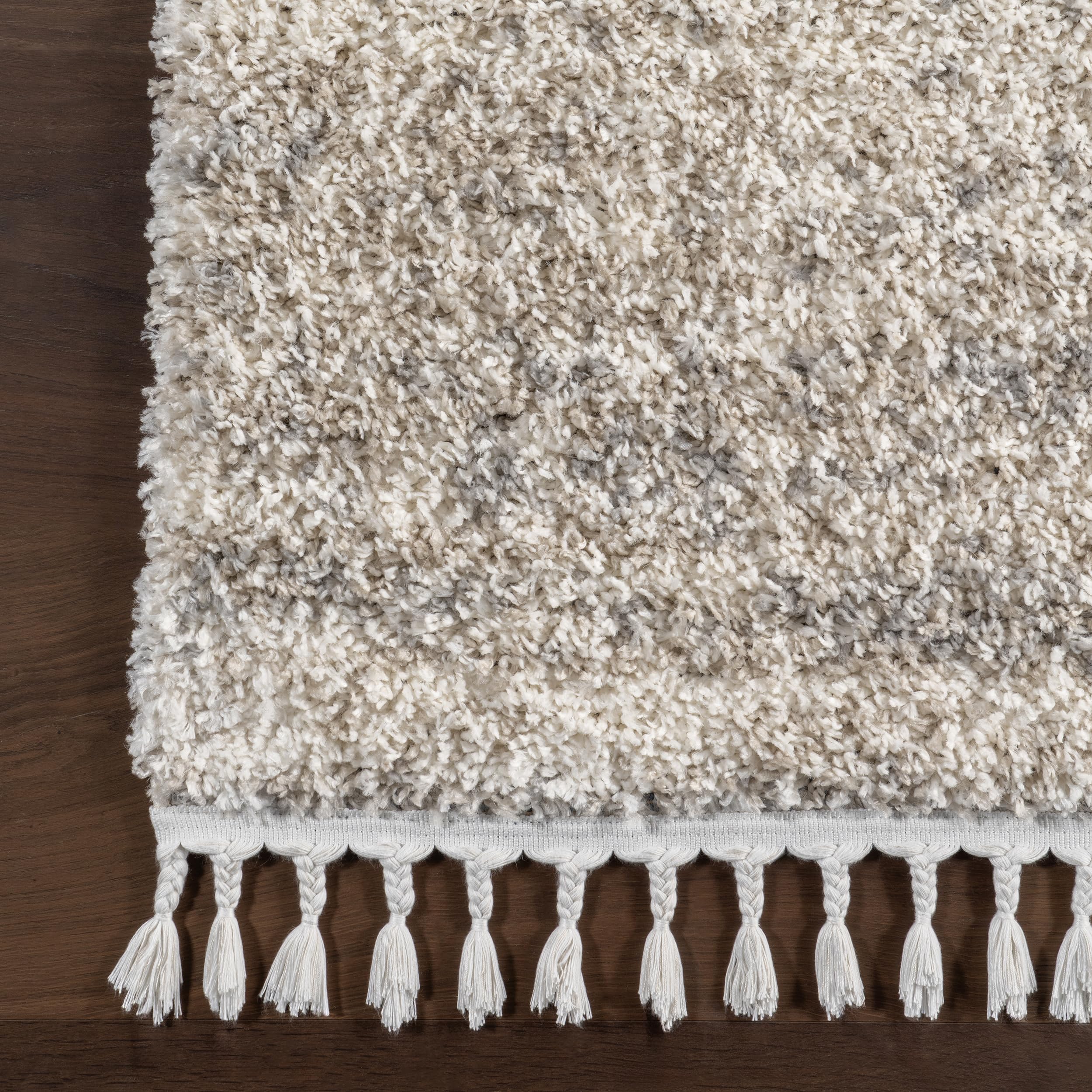nuLOOM Brooke Shag Tasseled Area Rug - Soft Plush 7x9 Oval Ivory Rug for Living Room, Bedroom, Dining Room & Nursery | Cozy Home Decor, Perfect for Family Gatherings & Relaxation