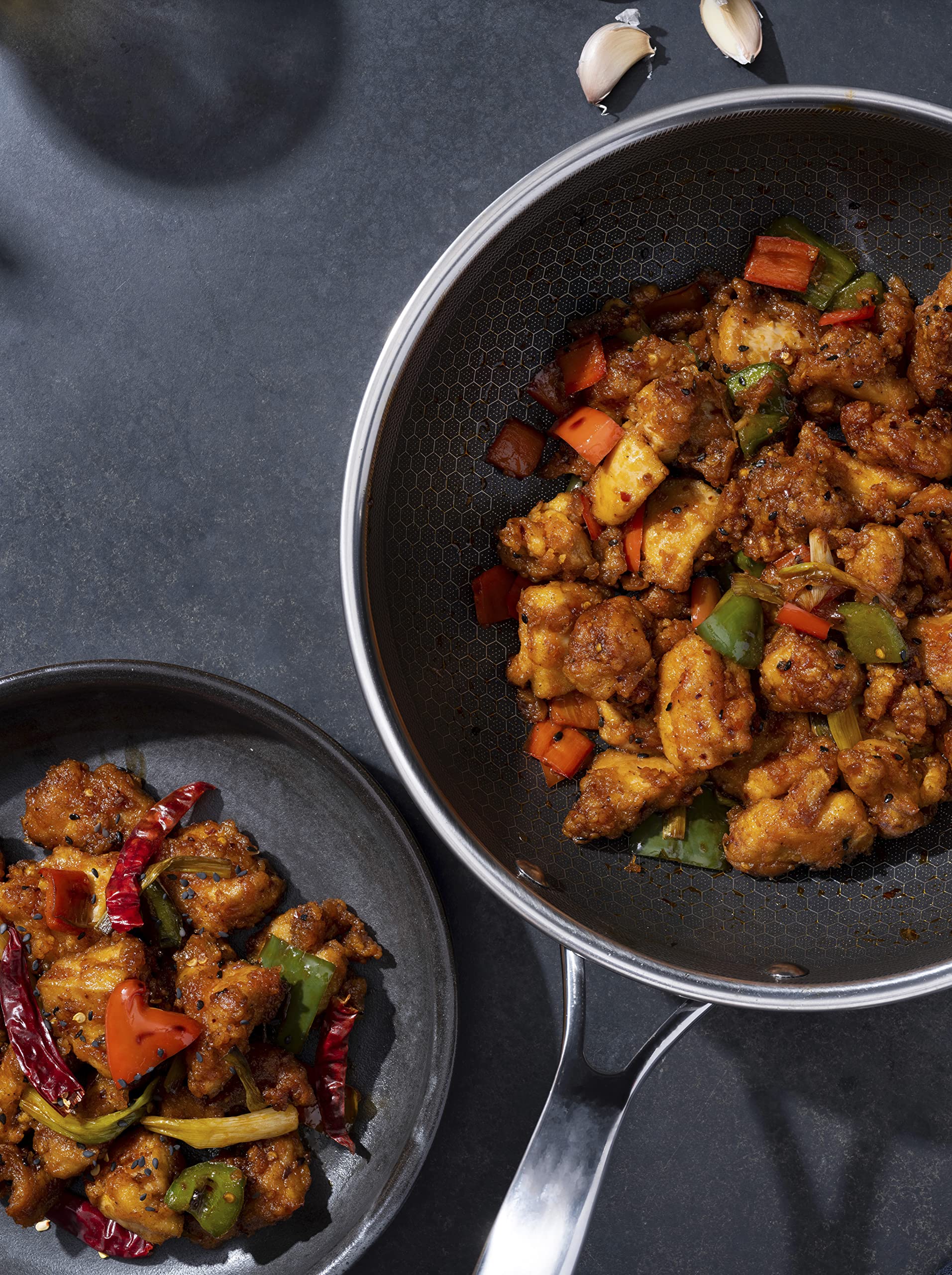 HexClad Hybrid Nonstick 10-Inch Wok Pan - Stay-Cool Handle, Dishwasher & Oven Safe to 900°F, Induction Compatible for All Cooktops - Perfect for Stir-Frying, Sautéing & Asian Cooking