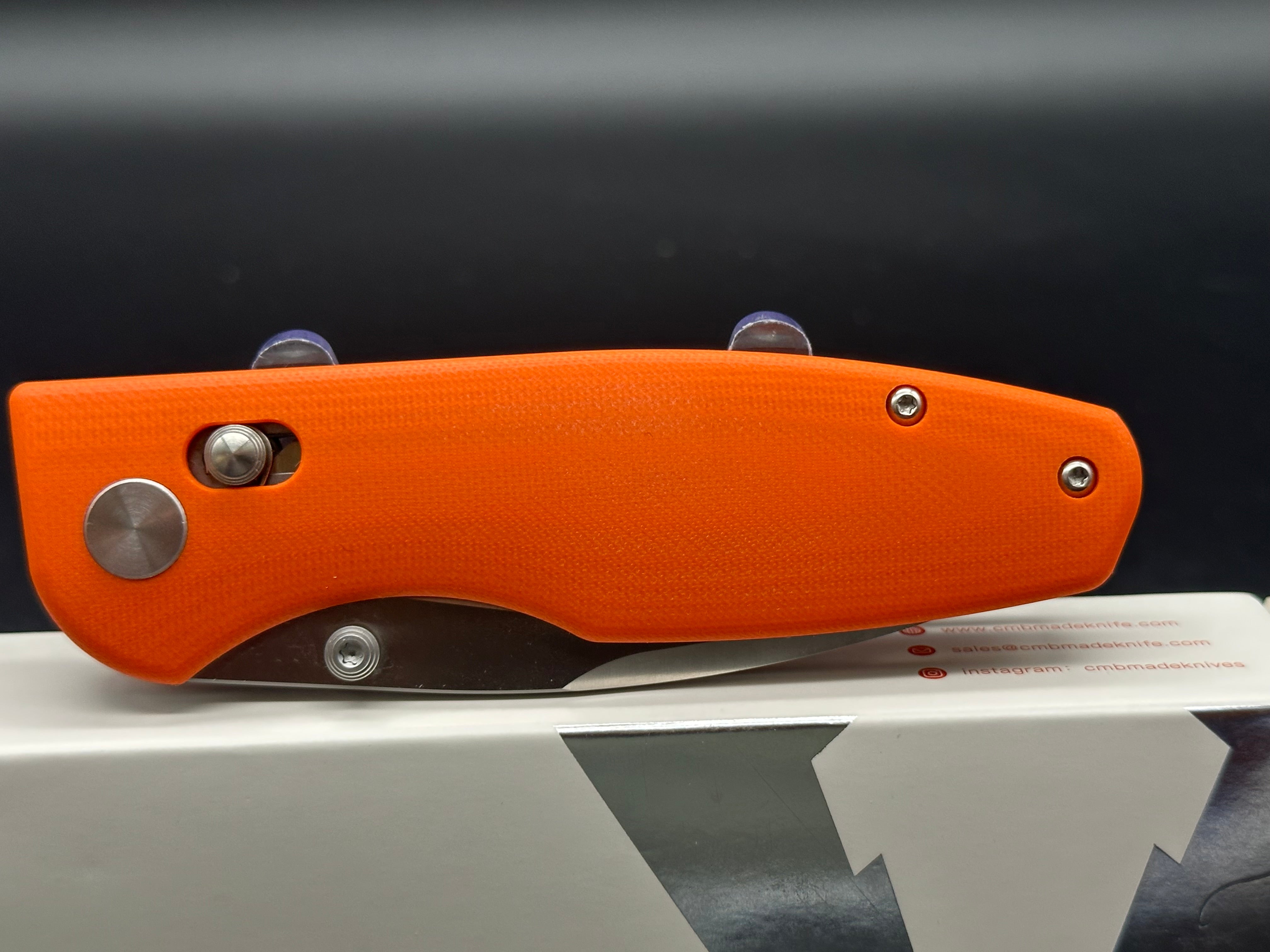CMB Predator Orange G10 Folding Knife with D2 Steel Blade - Perfect for Outdoor Camping, Hunting, and Survival Adventures