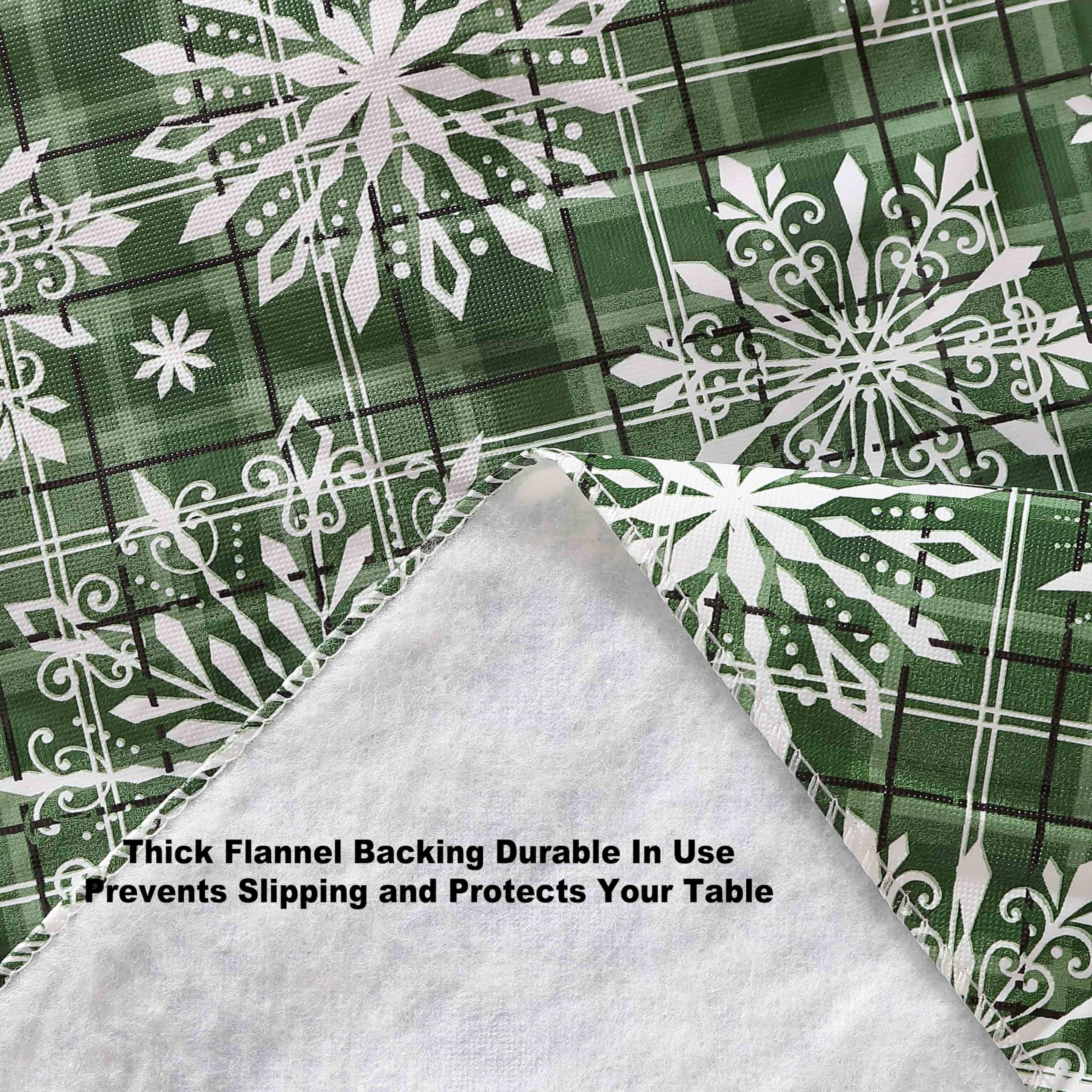 Newbridge Snowflake Plaid Christmas Tablecloth - 60x84 Inch Oval Green Vinyl Flannel Backed Holiday Table Cover with Snowfall Print | Easy Care Wipe Clean | Perfect for Christmas Dinner, Holiday Parties & Winter Decor