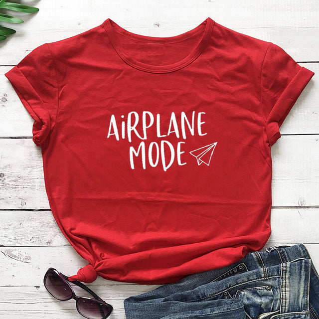 red tee white text