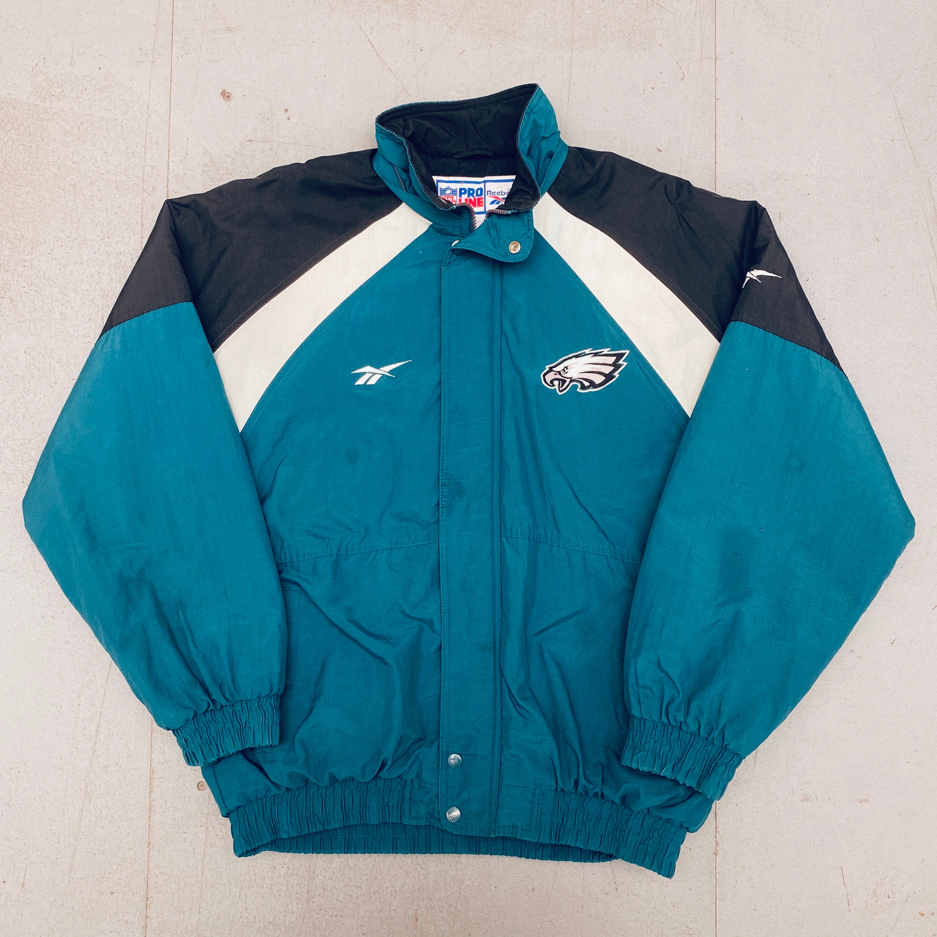 Philadelphia Eagles 1990s Reebok Reverse Spellout Full-Zip Proline Jacket for Men - Vintage NFL Football Fan Gear for Game Day & Casual Wear