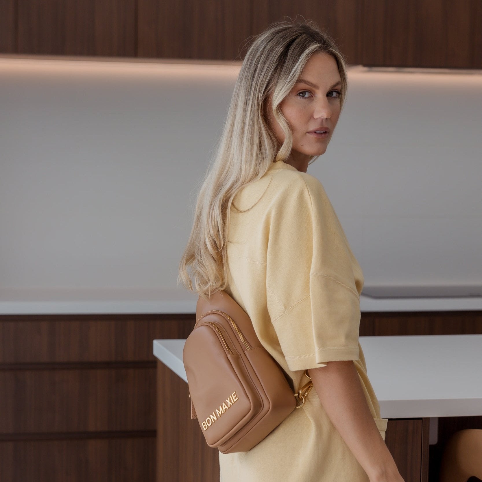 Stylish Multi-Wear Leather Crossbody Sling Bag for Women & Men - Tan with Bold Logo - Perfect for Travel, Work & Everyday Use