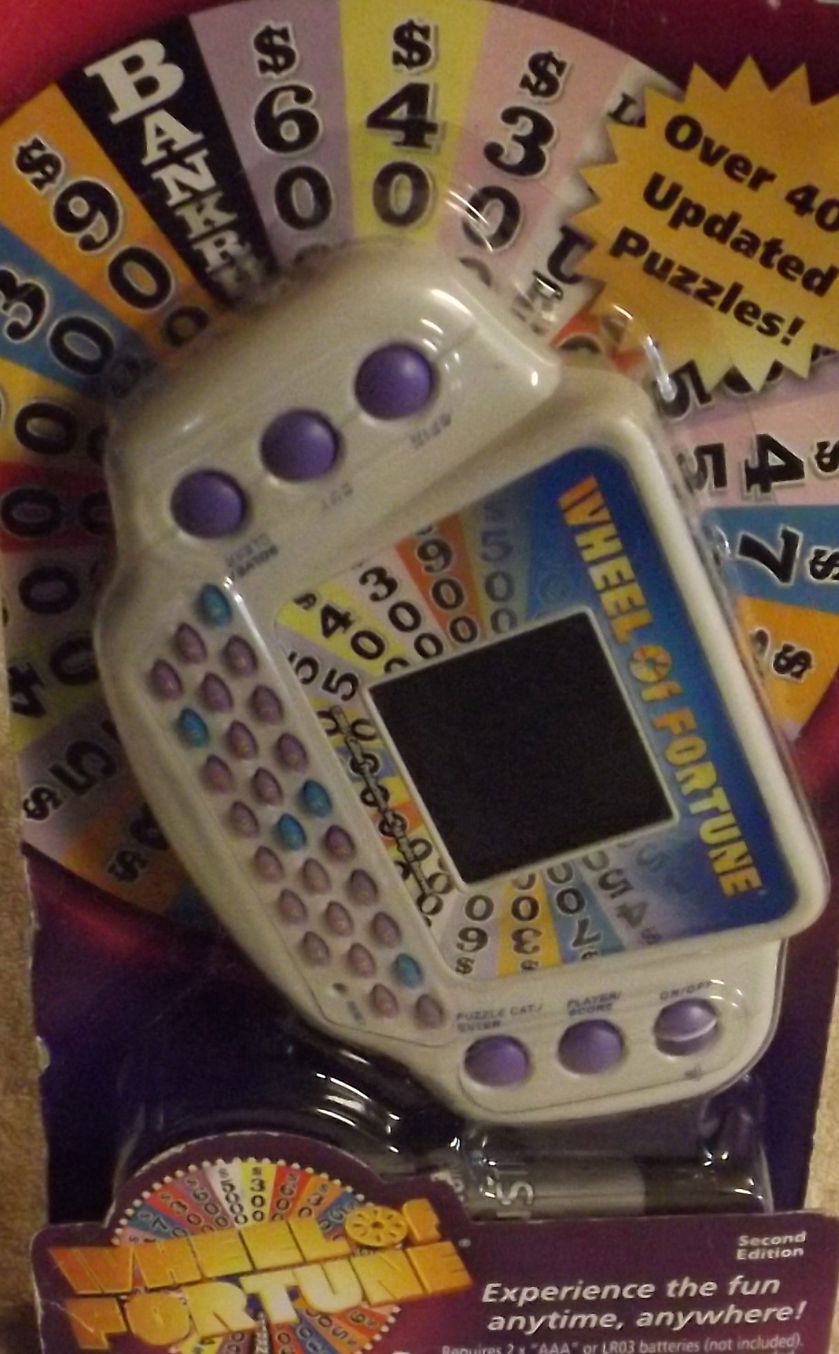 Wheel of Fortune Handheld Electronic Game by Hasbro Gaming - Fun Family Trivia Challenge for Parties & Travel