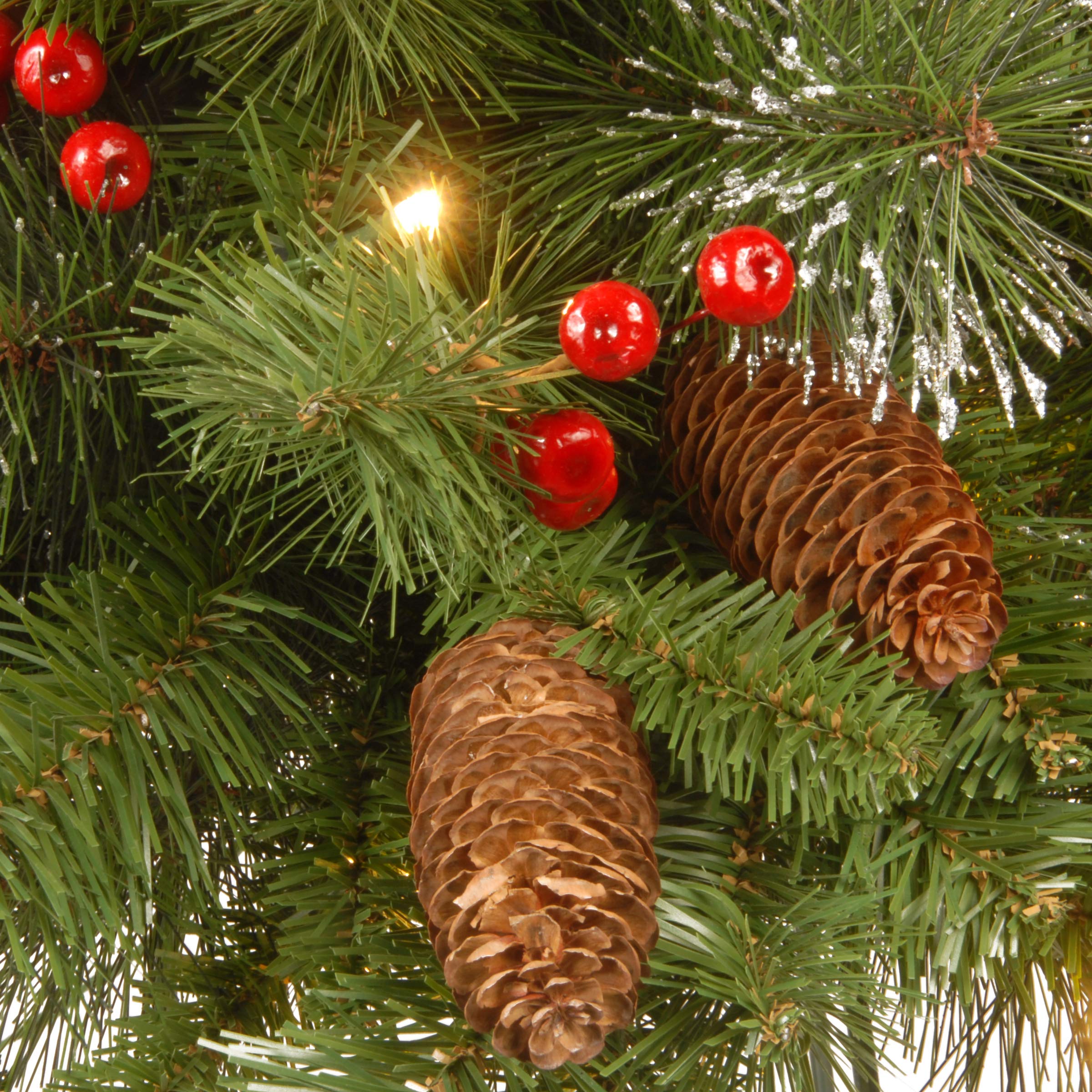 National Tree Company 9ft Pre-Lit Artificial Christmas Garland - Green Crestwood Spruce with White Lights, Pine Cones & Berry Clusters | Indoor/Outdoor Holiday Decor for Mantels, Staircases & Doorways