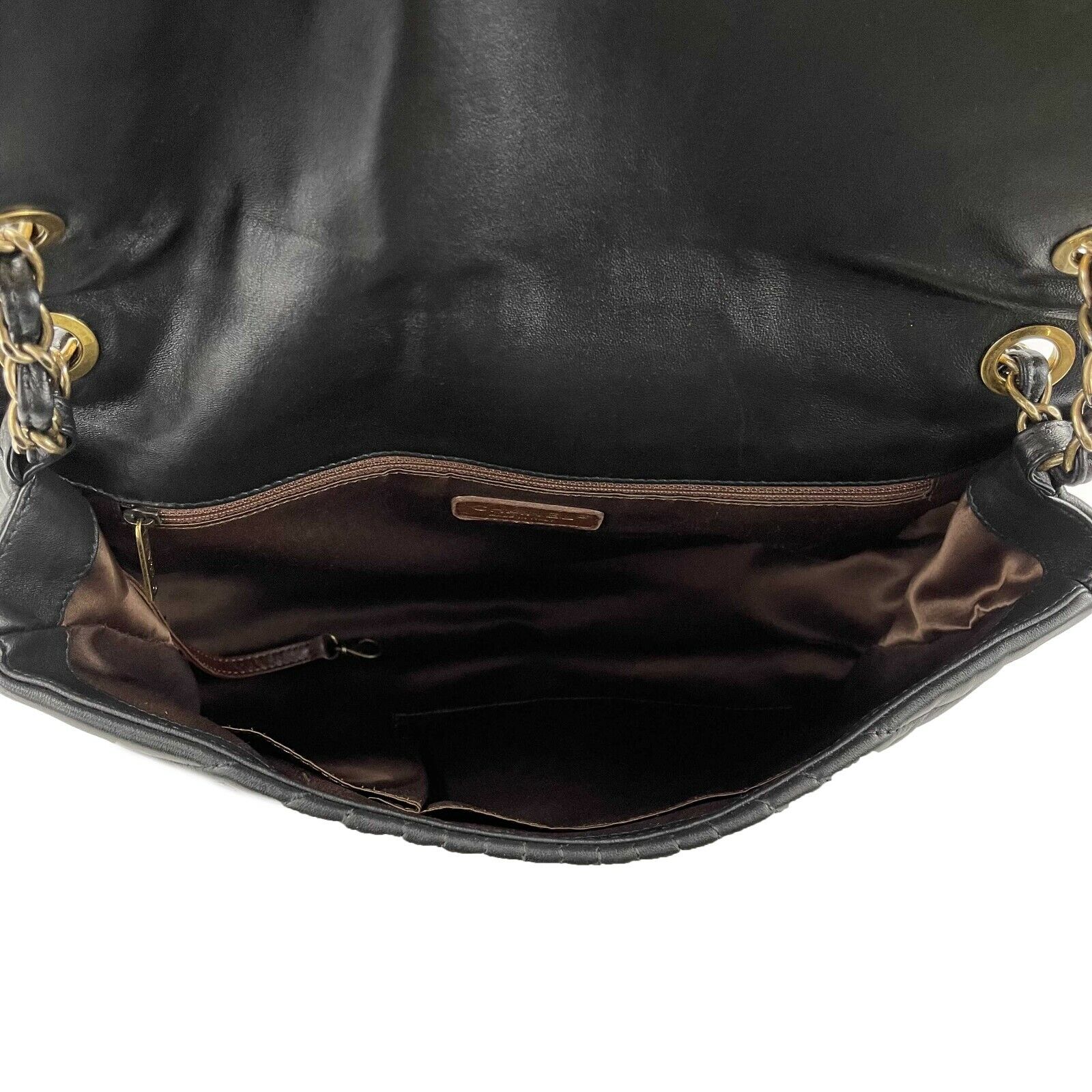 CHANEL Wave Quilted Black Calfskin Leather Maxi Flap Bag with Gold-Tone Hardware - Luxury Shoulder Bag for Women, Perfect for Evening Events, Parties & Special Occasions