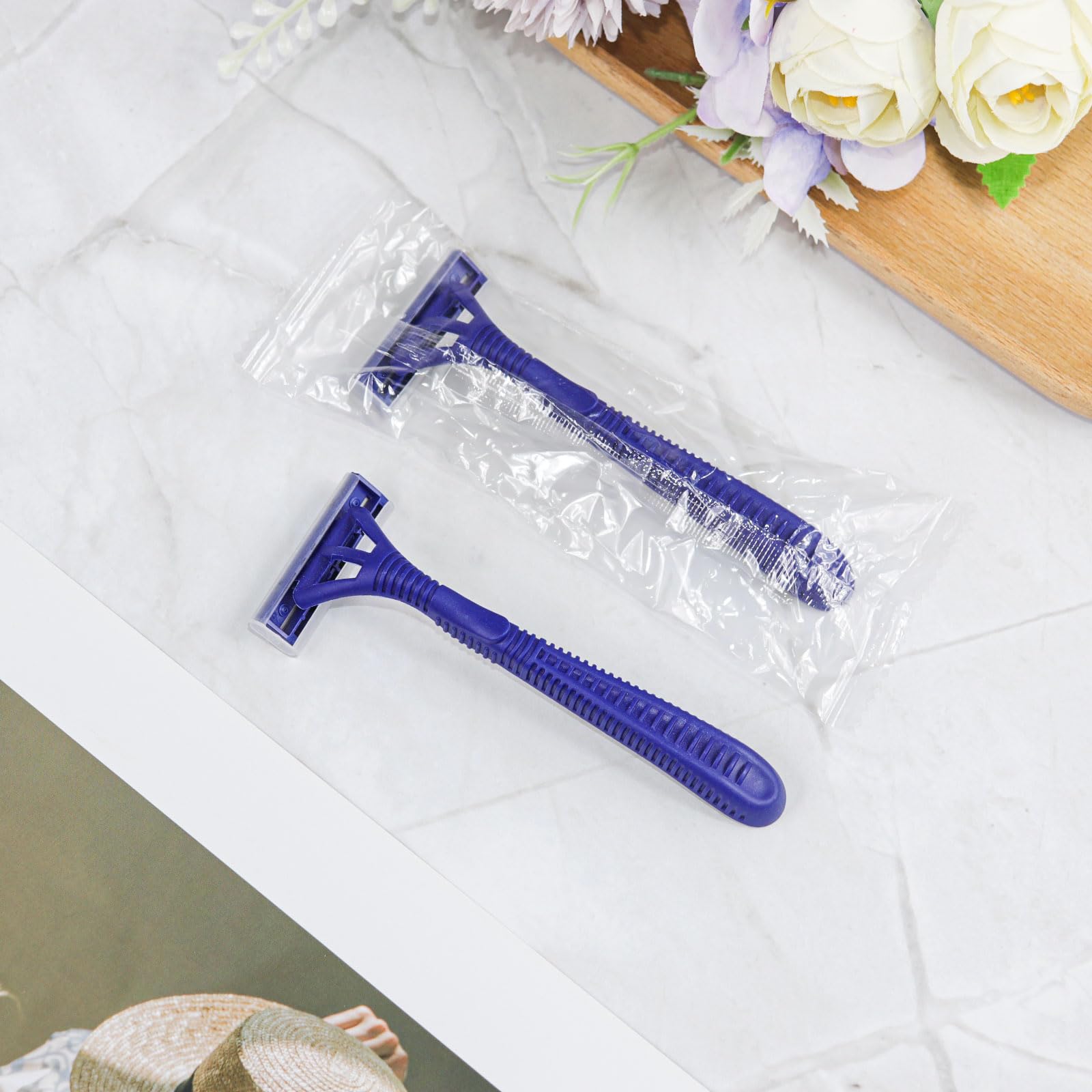 Bulk Disposable Razors with Blade Caps - 50-Pack Individually Wrapped for Safety - Ideal for Hotels, Shelters, Nursing Homes & Charities - Perfect Travel & Personal Hygiene Essential