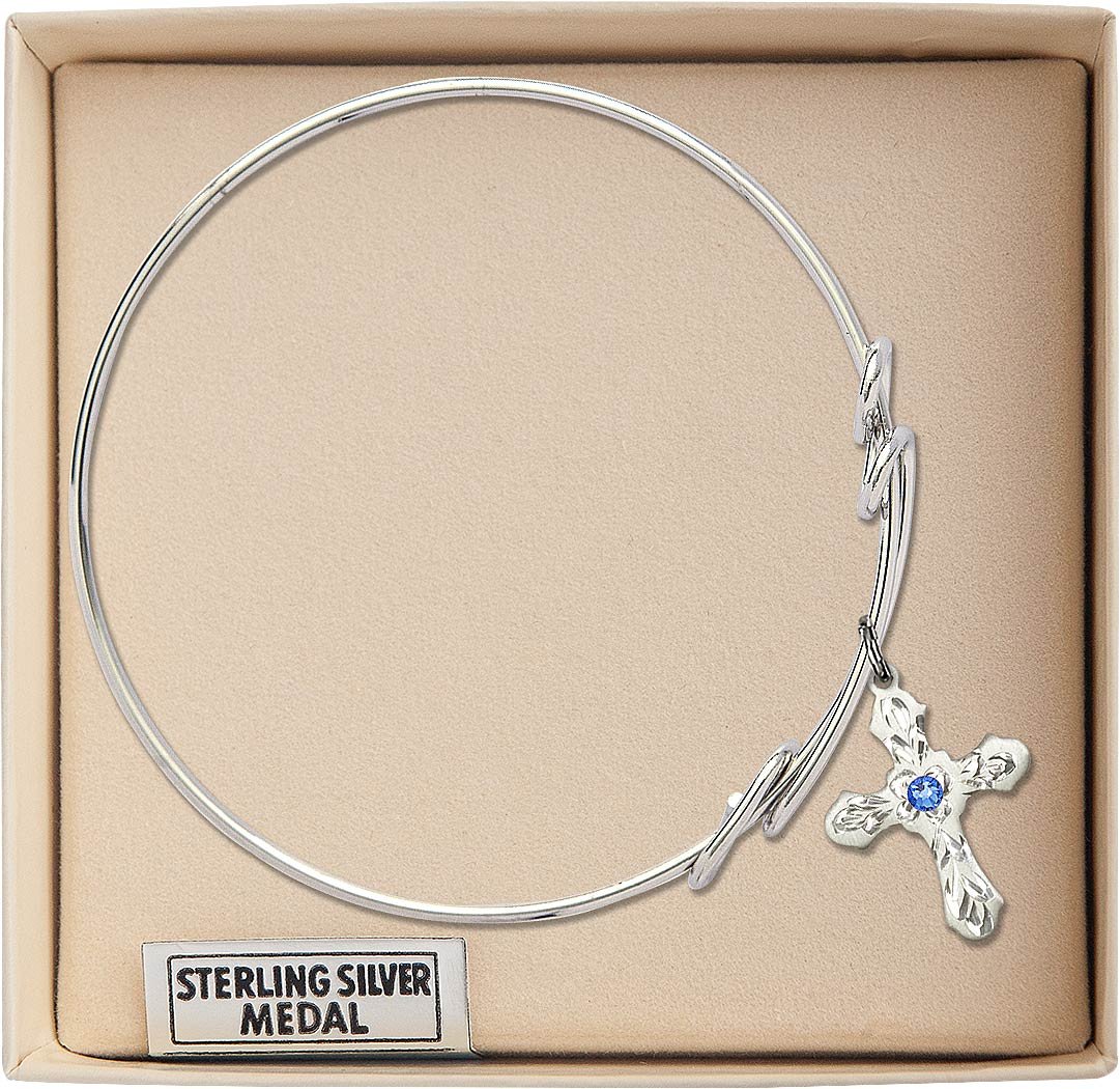 8 1/2 Inch Round Double Loop Bangle Bracelet with Cross Charm & September Birthstone Blue Crystal - Perfect for Everyday Wear, Gift Giving & Special Occasions