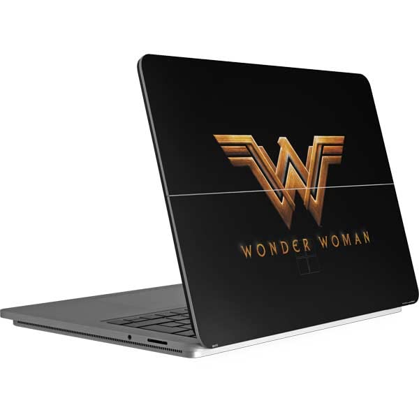 Skinit Officially Licensed Warner Bros Wonder Woman Gold Logo Laptop Skin Decal for Microsoft Surface Laptop Studio - Protective Vinyl Sticker for School, Office & Travel