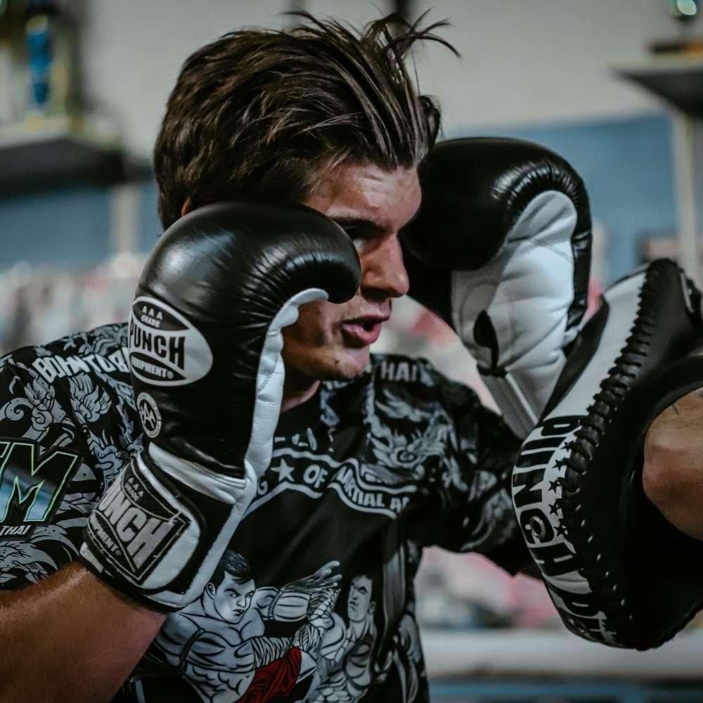 PUNCH Equipment Trophy Getters® Professional Boxing Gloves - Black | Heavy Bag Training, Sparring & Competition | Premium Leather Boxing Gloves for Men & Women