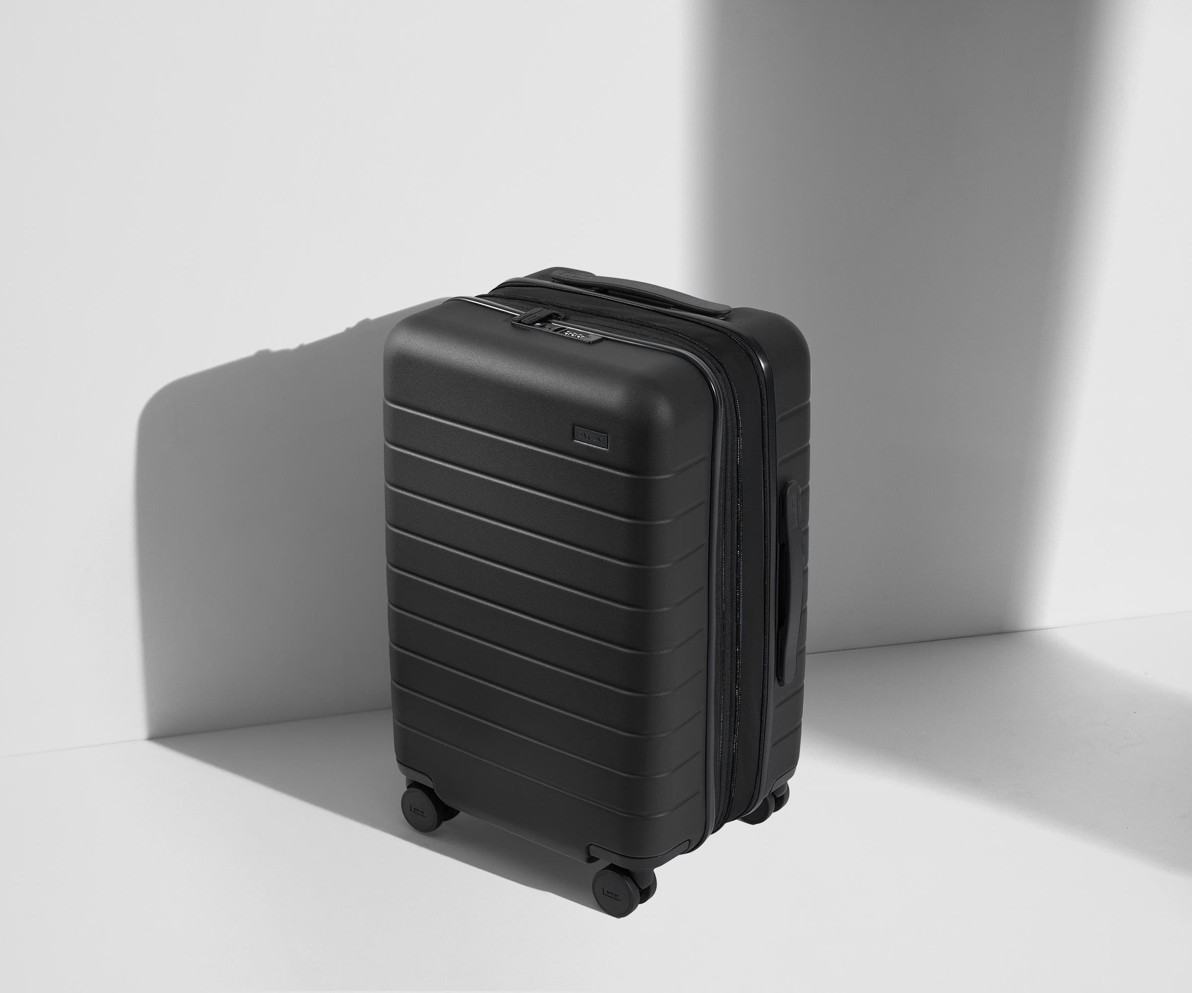 The Carry On Flex in Jet Black - Lightweight Expandable Luggage for Travel, Business & Weekend Getaways