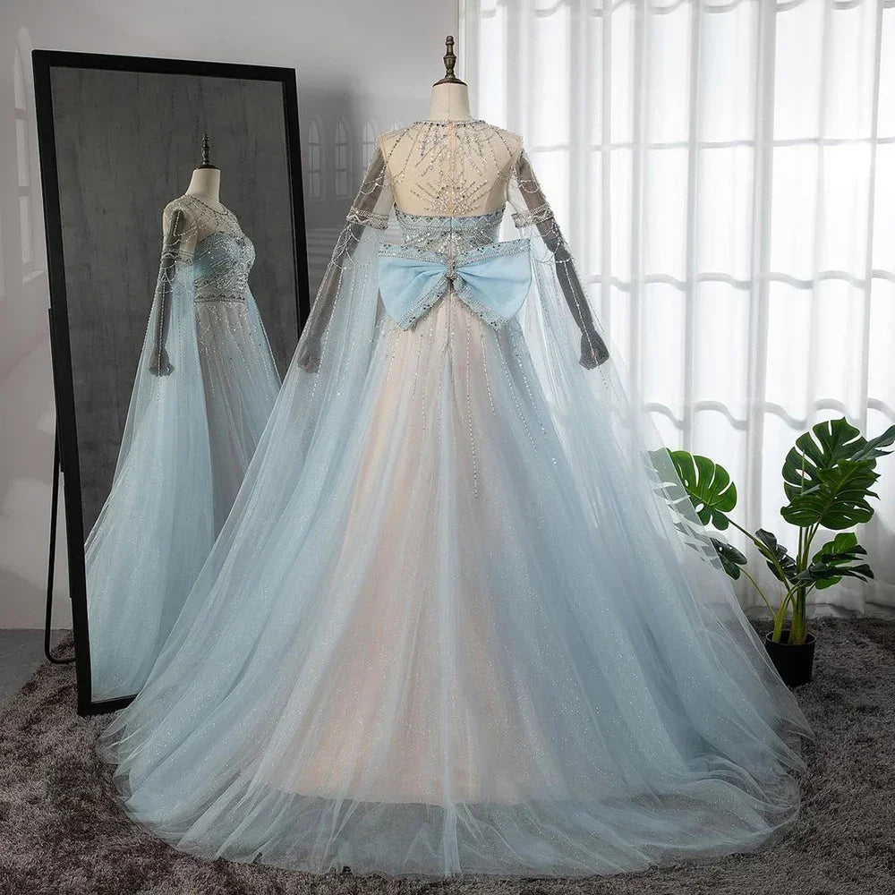 Elegant Blue A-Line Arabic Cape Sleeve Evening Gown with Beaded Bow Detail - Luxury Formal Dress for Women 2025 | Perfect for Weddings, Galas & Special Occasions