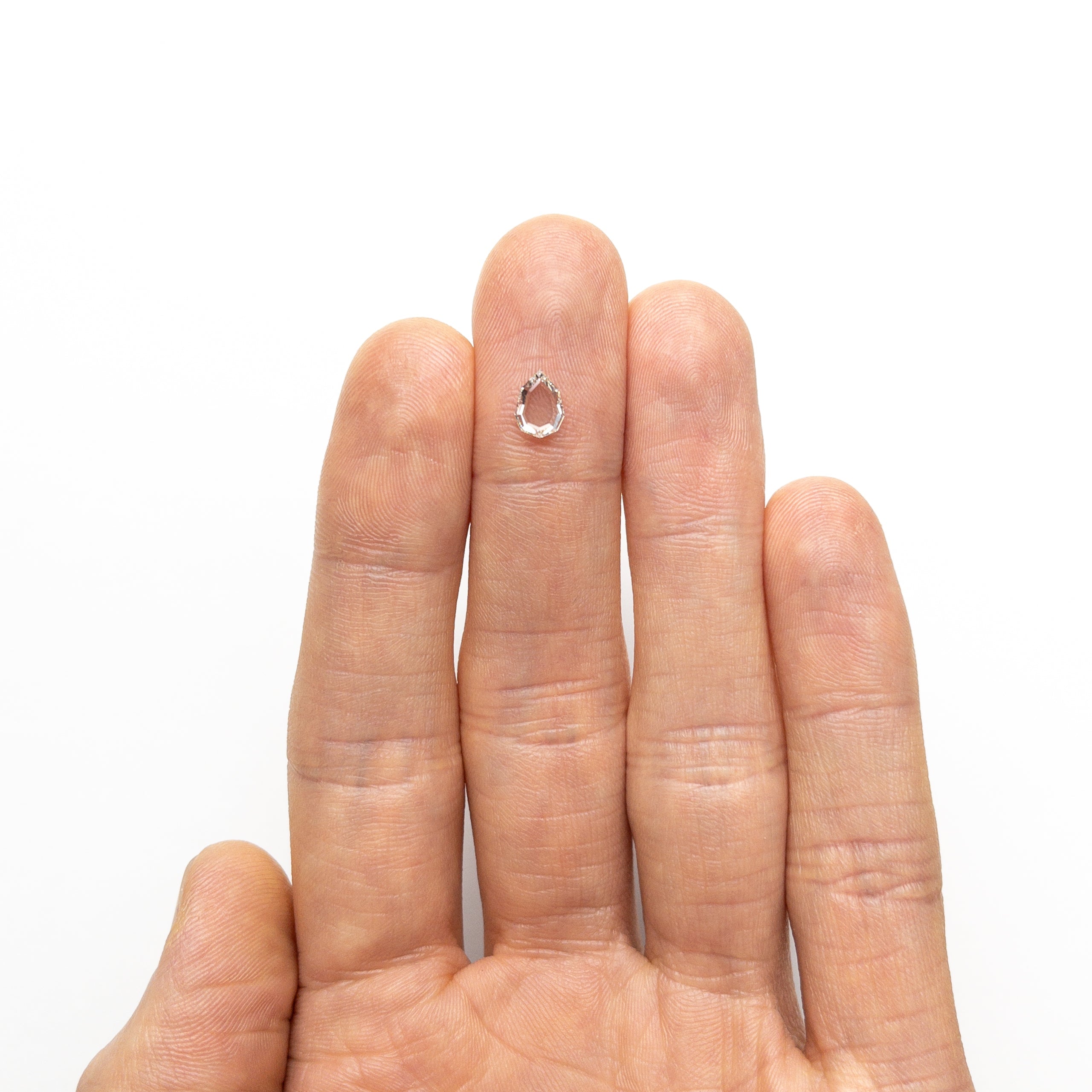 0.57ct Pear-Shaped Diamond (7.13x5.28x1.64mm) VS1 Clarity J Color - Geo Portrait Cut for Engagement Rings & Fine Jewelry