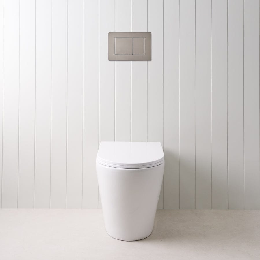 Angled In-Wall Toilet with Rectangle Gunmetal Buttons - Modern Space-Saving Bathroom Solution for Small Spaces and Contemporary Homes