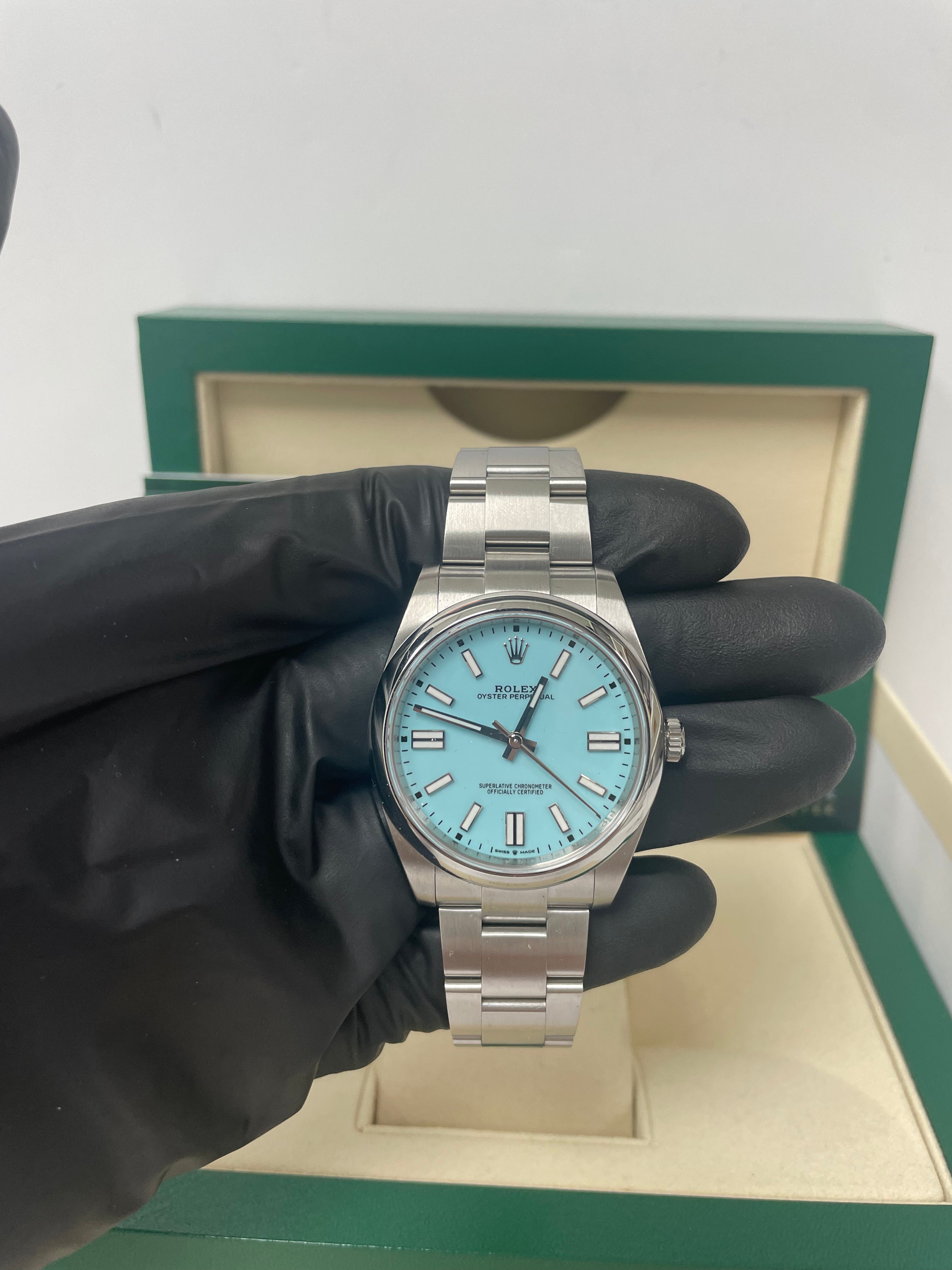 Rolex Oyster Perpetual 41mm Men's Watch - Stainless Steel Case, Turquoise Blue Dial, Oyster Bracelet (Ref# 124300) | Luxury Dress Watch for Business & Formal Occasions
