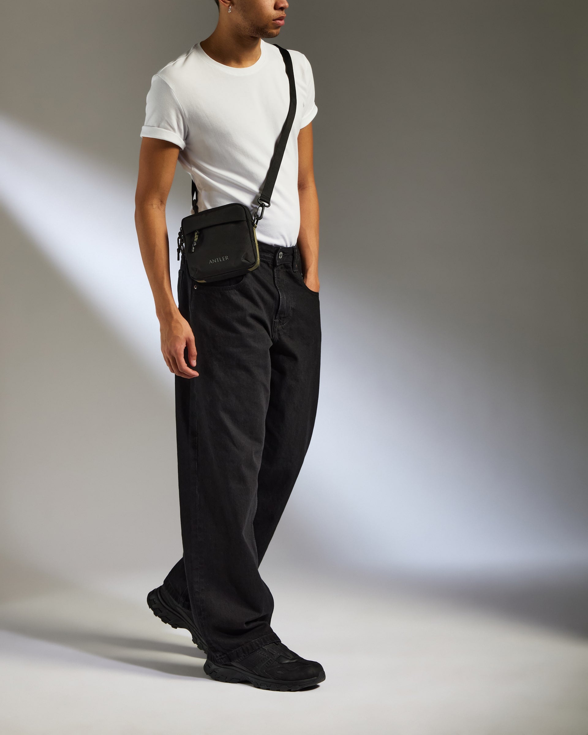 Premium Carbon Black Discovery Crossbody Bag - Stylish & Durable for Travel, Work & Everyday Use