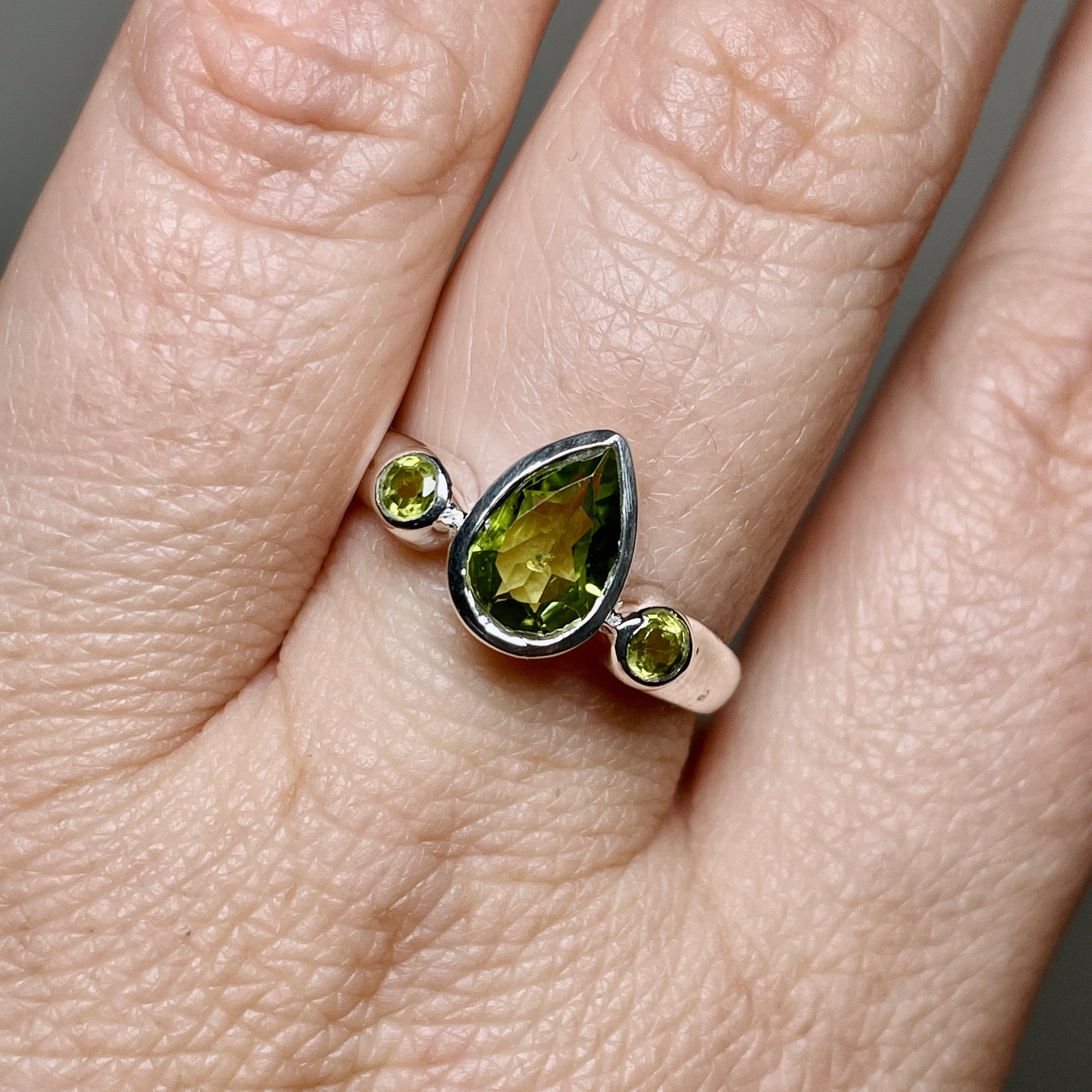 Peridot Faceted Gemstone Teardrop Ring with Accent Stones R3668 - Elegant Green Jewelry for Women, Perfect for Weddings, Parties & Special Occasions