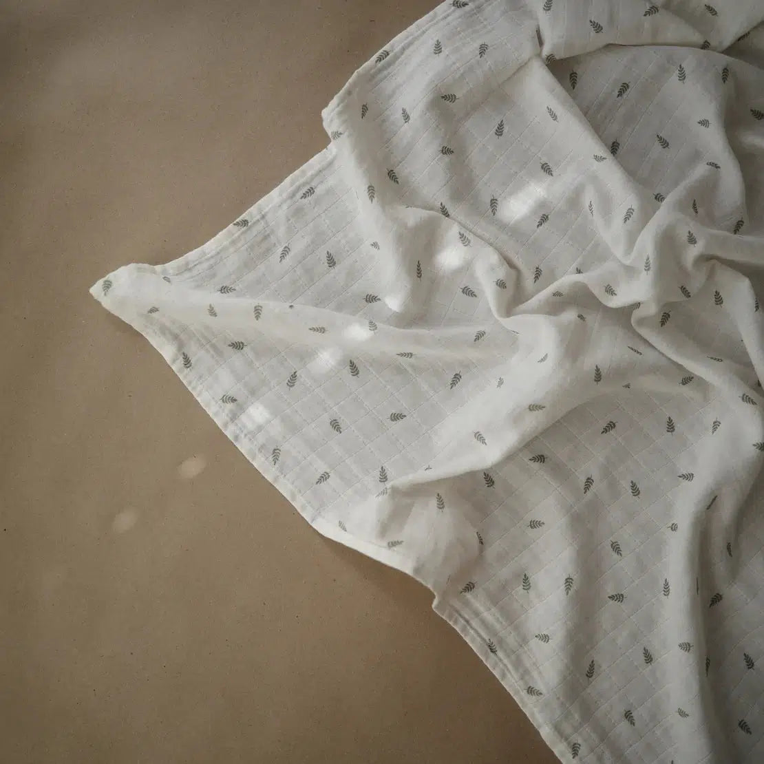 Mushie Organic Cotton Muslin Swaddle Blanket - Soft Baby Swaddle Wrap for Newborns & Infants - Breathable & Lightweight - Leaves Design - Perfect for Nursery, Swaddling, Stroller & Photo Shoots