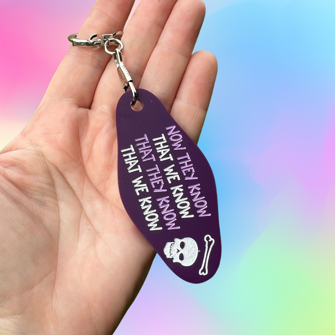 The Burbs Movie Quote Keychain - Now They Know That We Know - Funny Novelty Gift for Fans - Perfect for Keychains, Bags, and Movie Memorabilia Collections