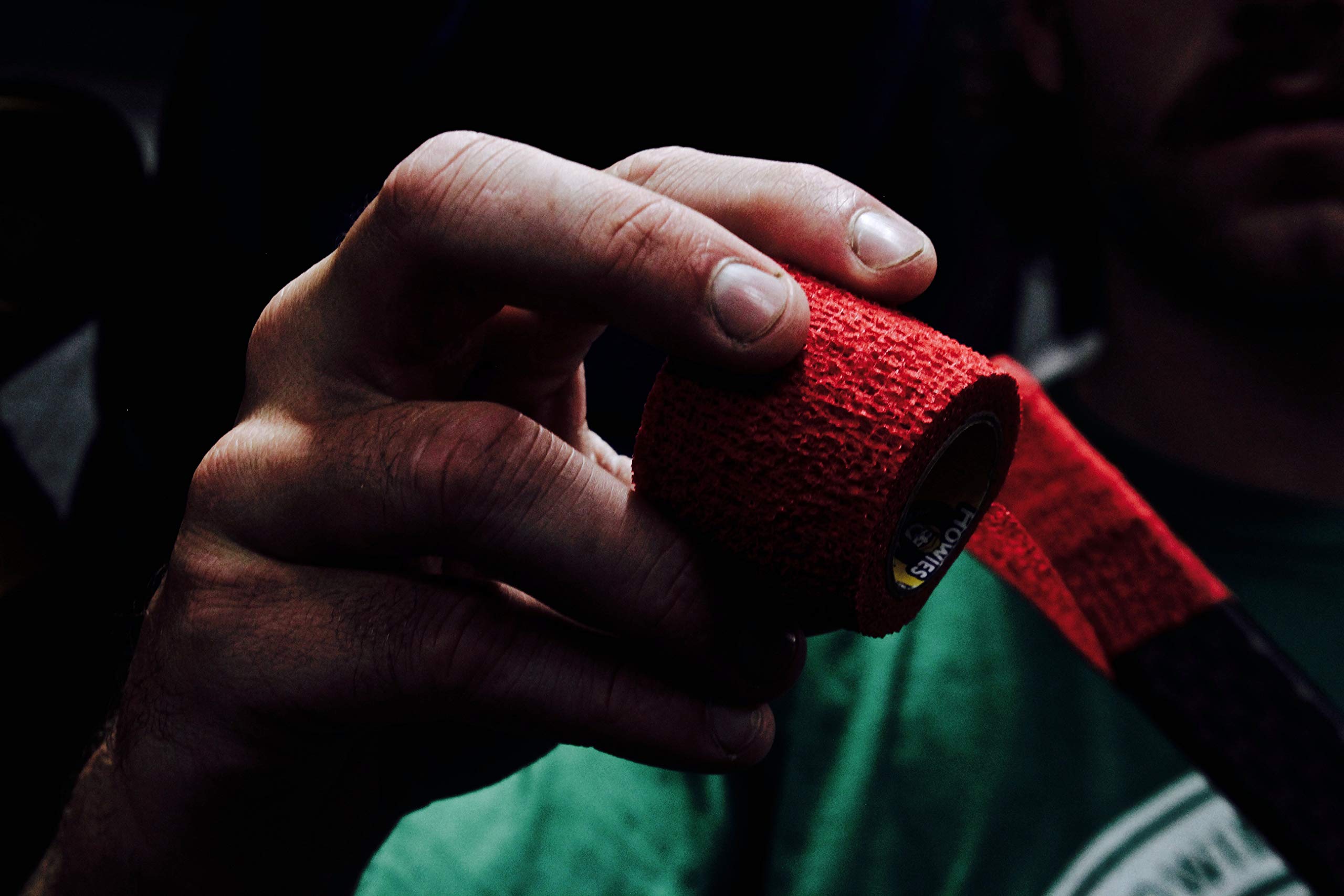 Howies Hockey Tape - Red Stretchy Grip Hockey Tape (12 Pack) | Premium Hockey Stick Grip Tape for Enhanced Control | Ideal for Ice Hockey, Street Hockey & Training Sessions