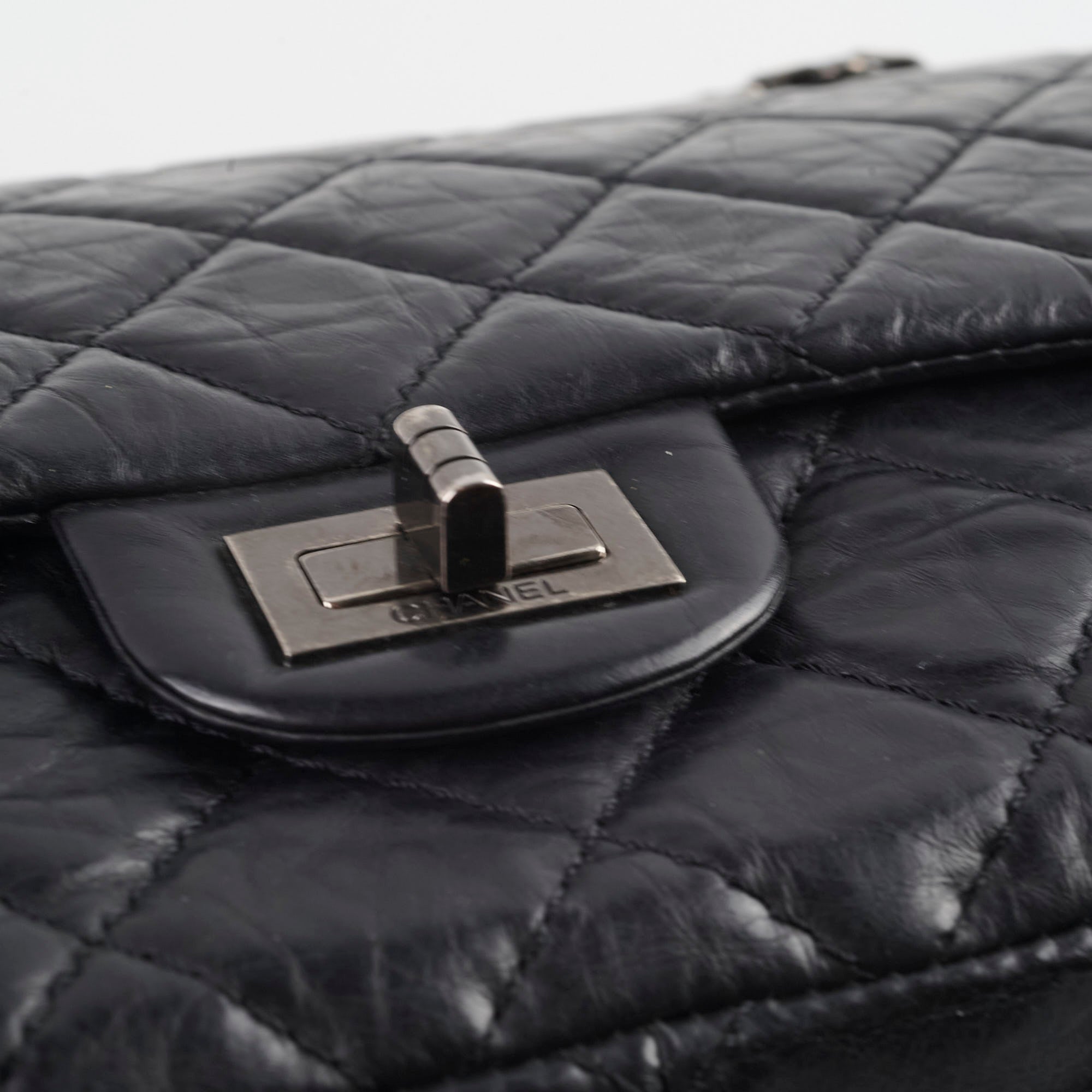 Authentic Chanel Reissue 226 Black Leather Flap Bag Series 12 - Luxury Handbag for Women, Perfect for Evening Events & Special Occasions