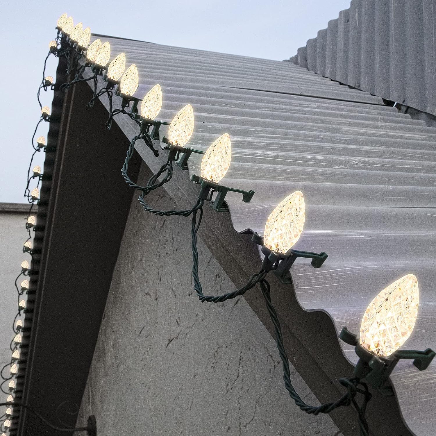 C9 Outdoor Christmas Lights - 66ft 100 LED String Lights with Quick Clips, Warm White Plug-in Connectable Holiday Lights for Roof, Gutter, House Decoration - Perfect for Xmas, Patio, Garden & Yard Decor
